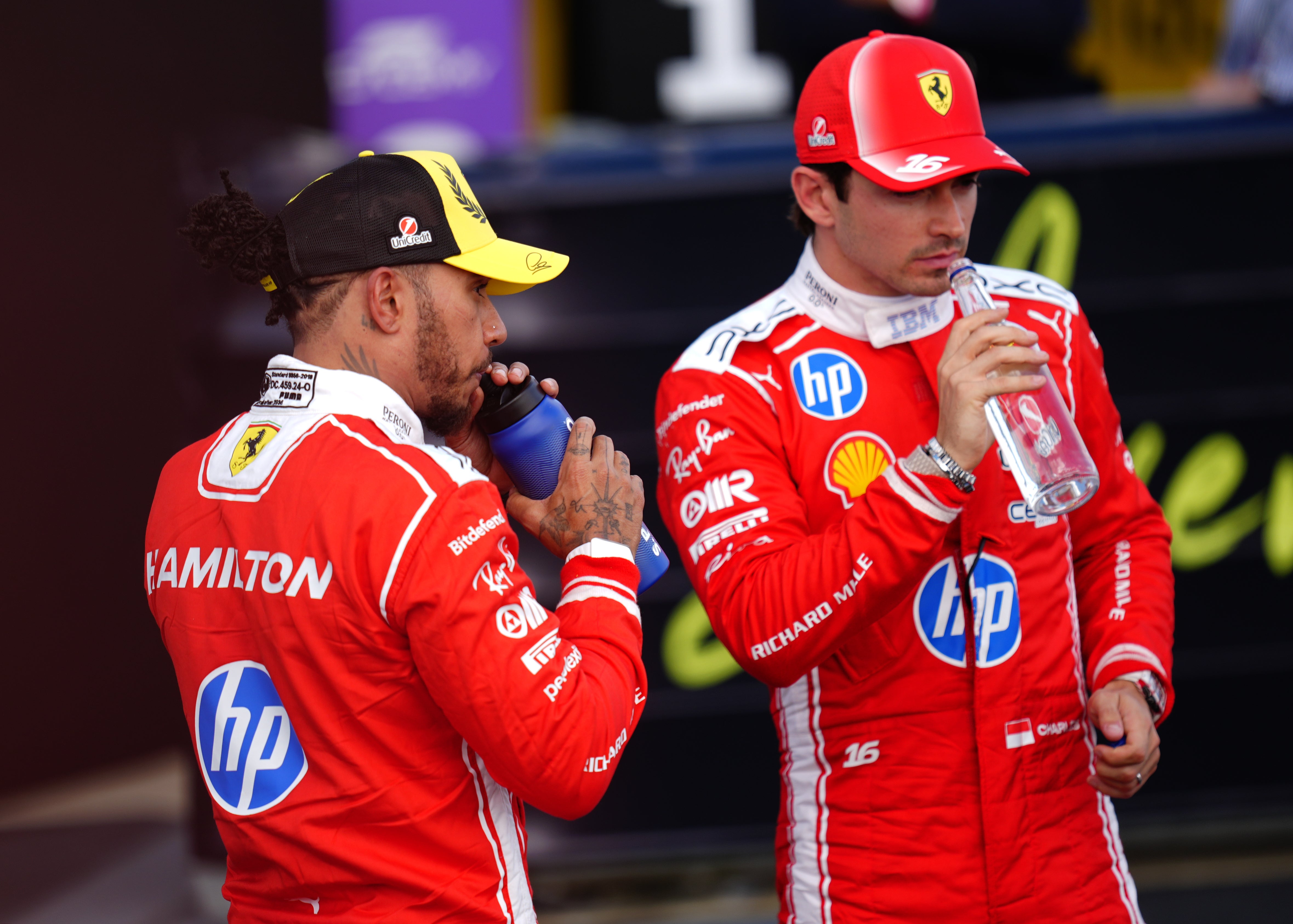 Lewis Hamilton (left), who has been warned that his in-fighting with Charles Leclerc at Ferrari "is not good for the team"