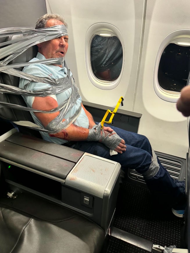 Arthur Lundeen, 67, was taped to his seat on an American Airlines flight on September 3. He was arrested by police after he allegedly became violent during the flight and attacked another passenger. The crew and a group of passengers subdued him and taped him to his seat for the last 15 minutes of the flight.