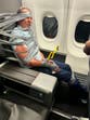 American Airlines passenger duct-taped to seat after mid-air meltdown loses his job