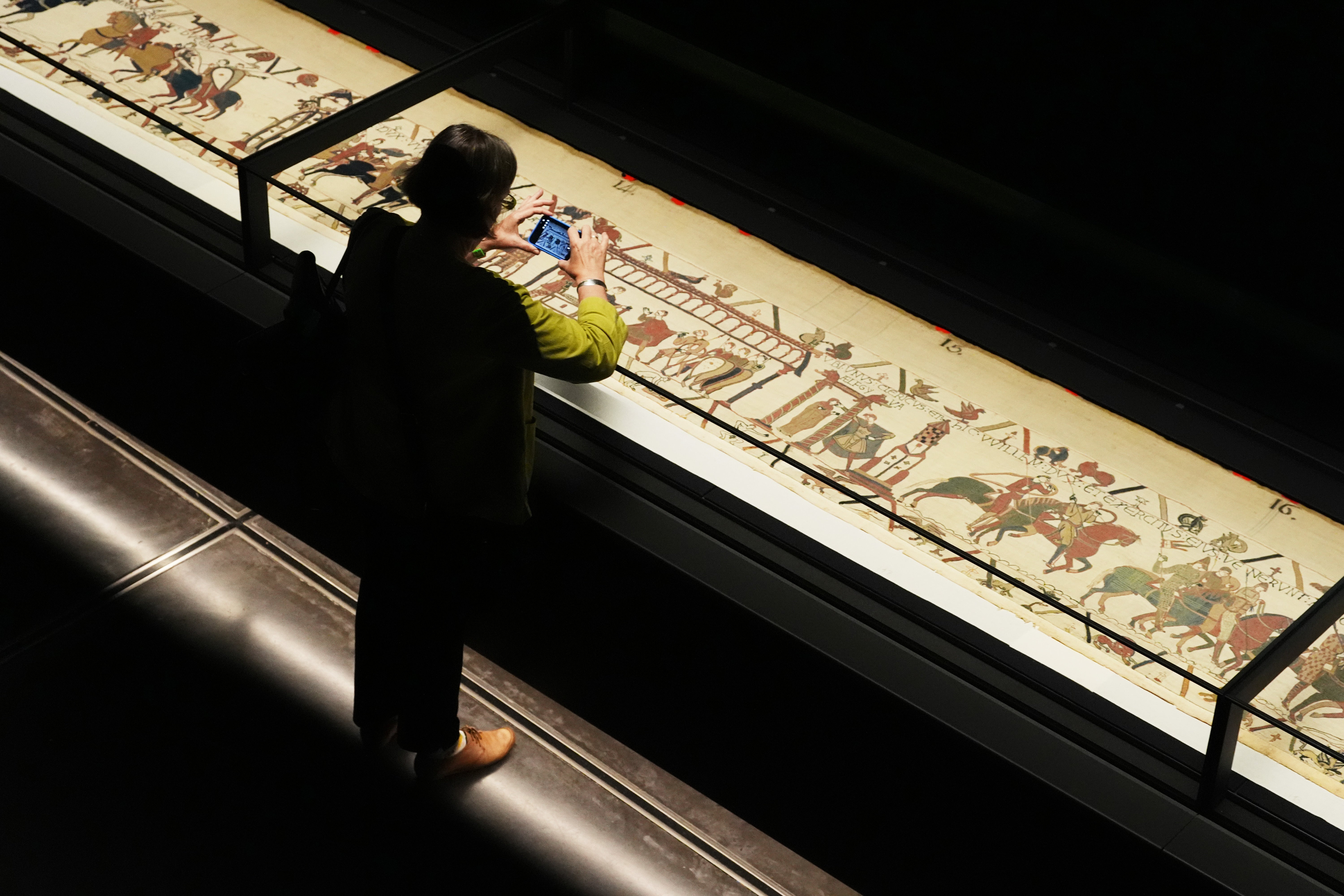 The 70-metre tapestry was being unveiled to the public on Thursday (Jonathan Brady/PA)
