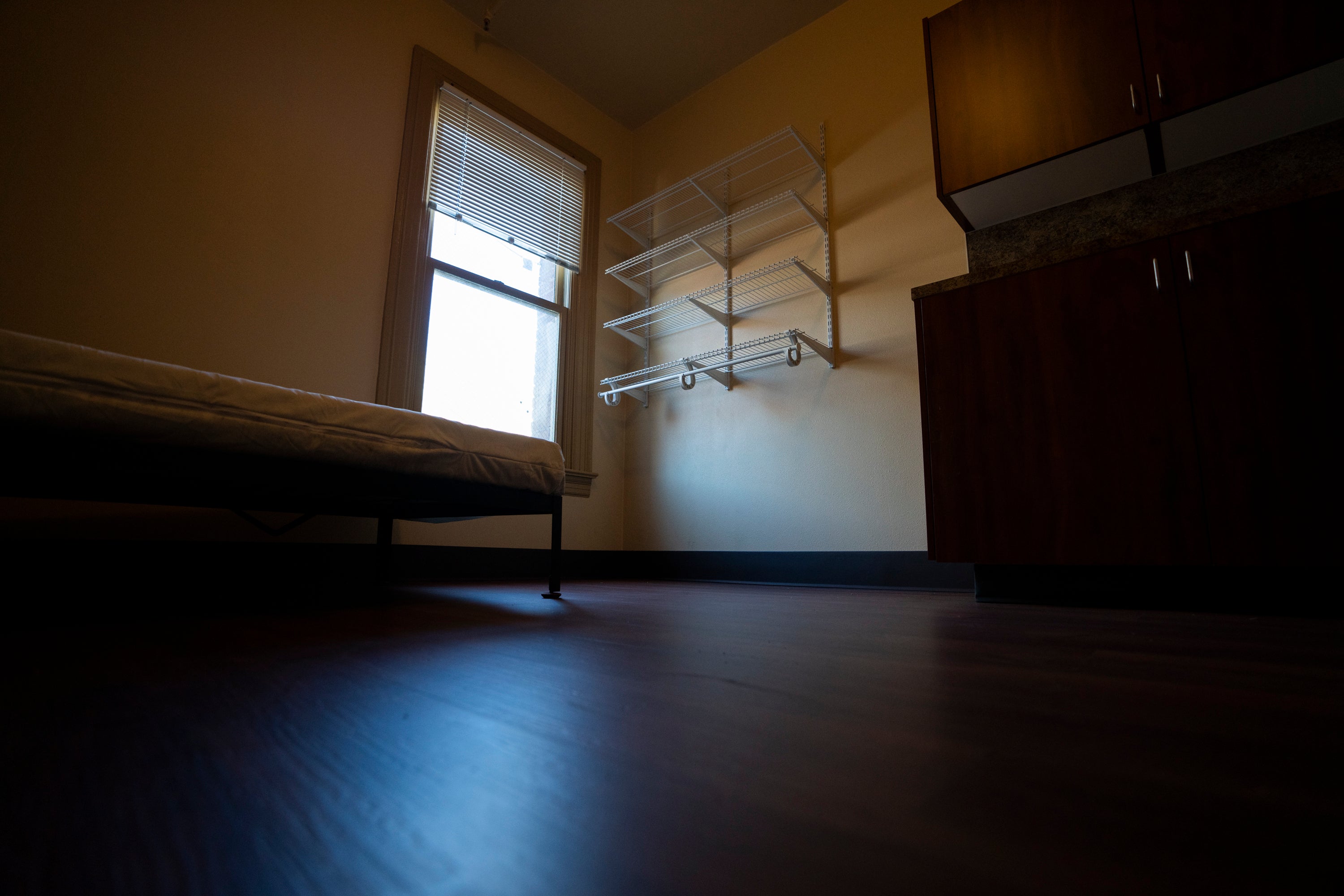 A window lets light into an empty bedroom in an affordable housing building run by Central City Concern, a homeless services nonprofit in Portland, Oregon