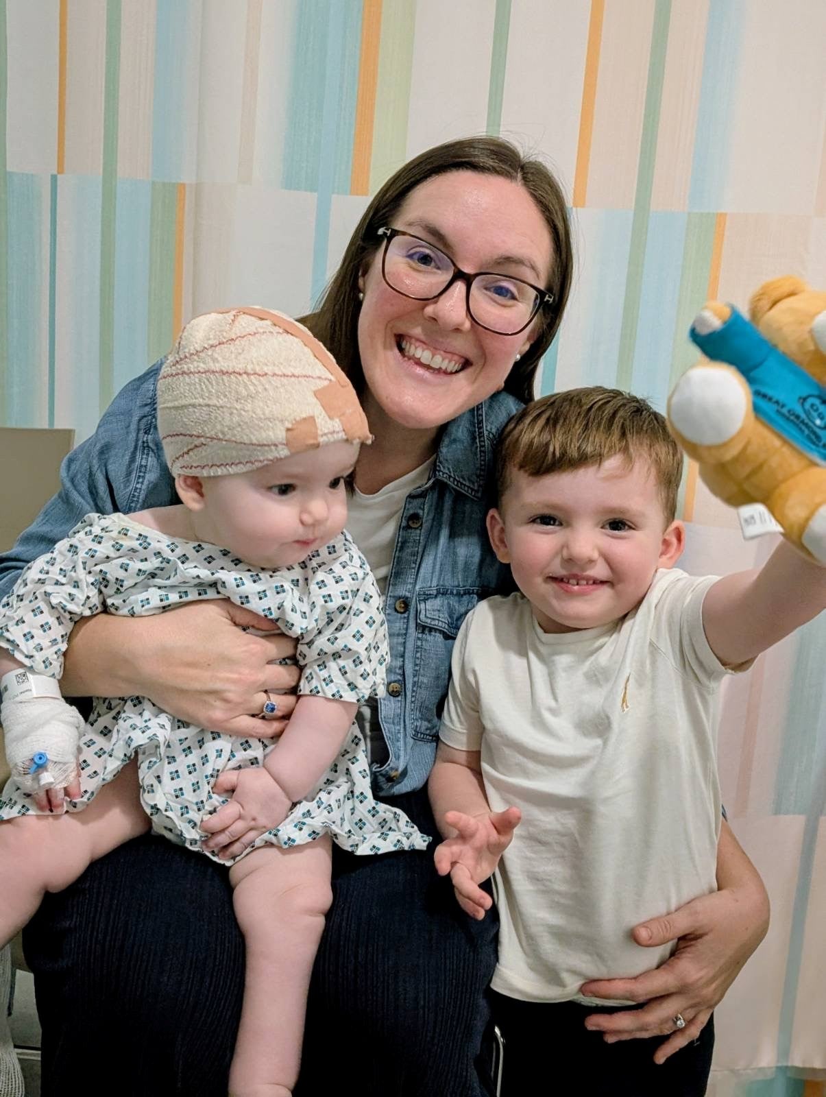 One-year-old Rory, pictured with his mum Jo Potter and brother Oscar, was diagnosed with severe sagittal craniosynostosis