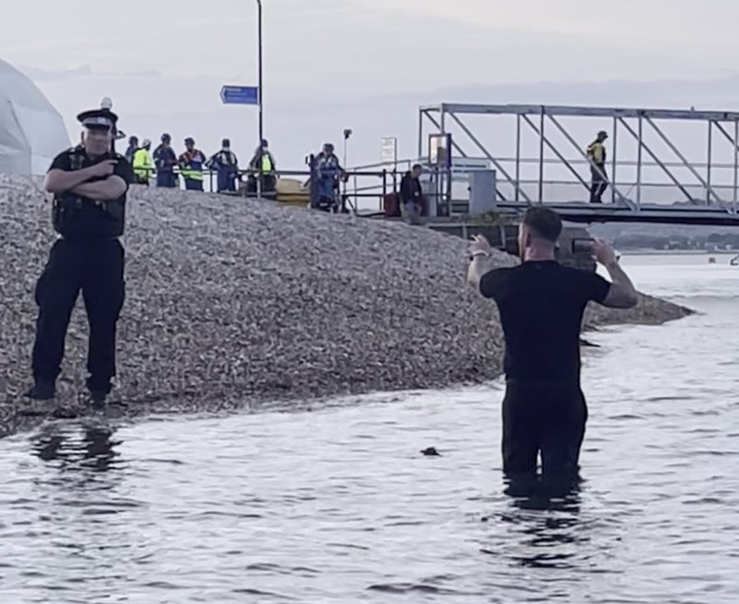 Daniel Thomas, known as Danny Tommo, live streams during the operation to rescue the migrants in Portsmouth