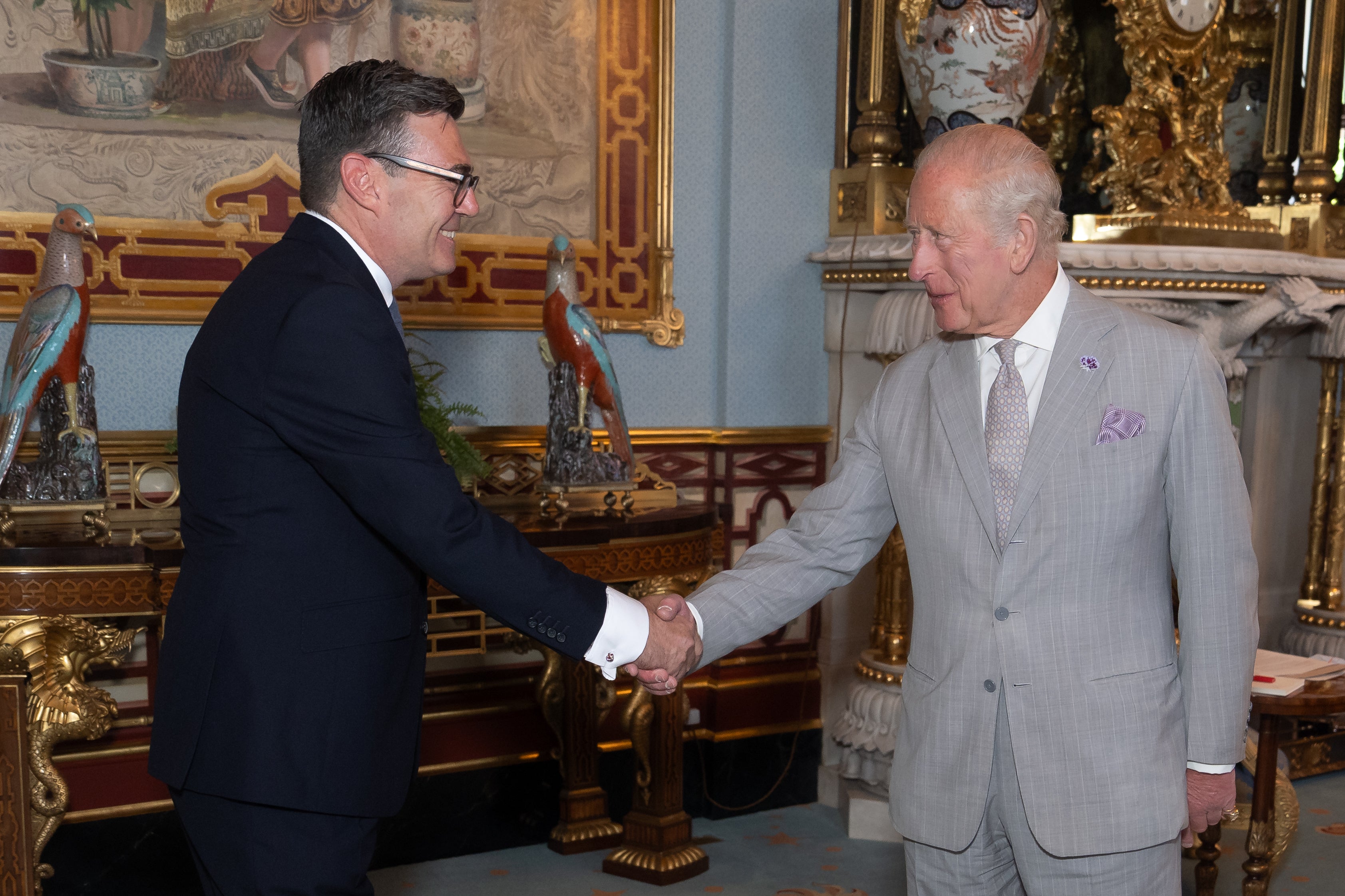 King Charles welcomes Andy Burnham, during an audience at Buckingham Palace, London