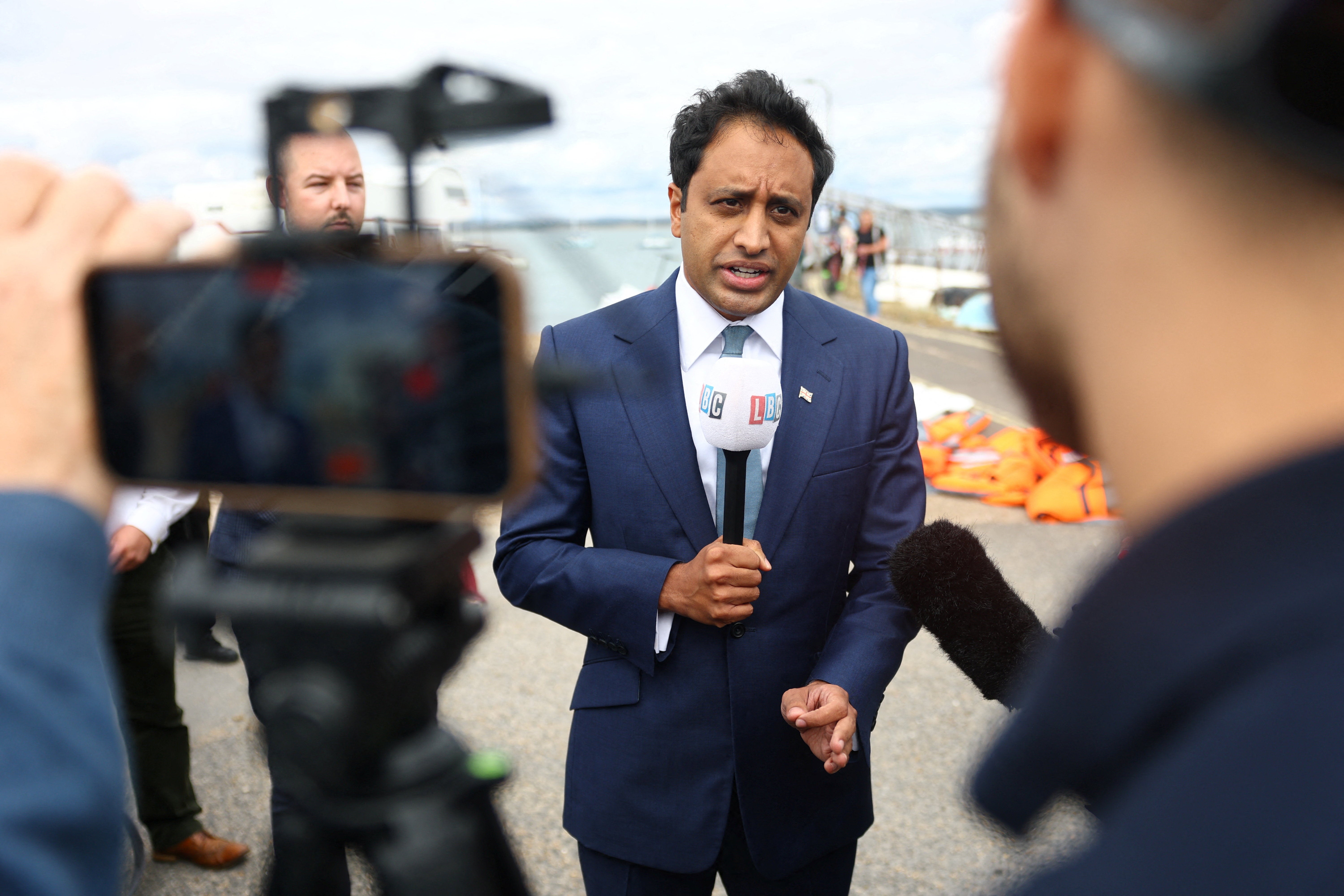 Reform UK Spokesperson for Home Affairs Zia Yusuf speaks to the media near the Eastney Ferry Landing, following anti-immigration protests in Portsmouth