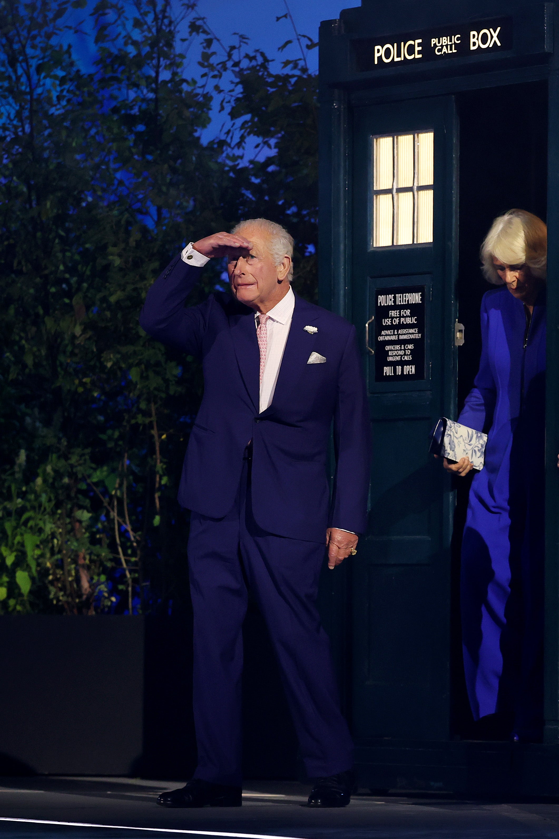 King Charles III and Queen Camilla walk out of the TARDIS during the opening ceremony ahead of the Glasgow 2026 Commonwealth Games