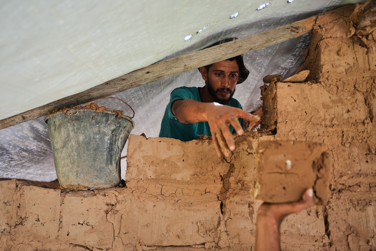 Palestinians in Gaza utilize makeshift materials to rebuild amid ongoing conflict