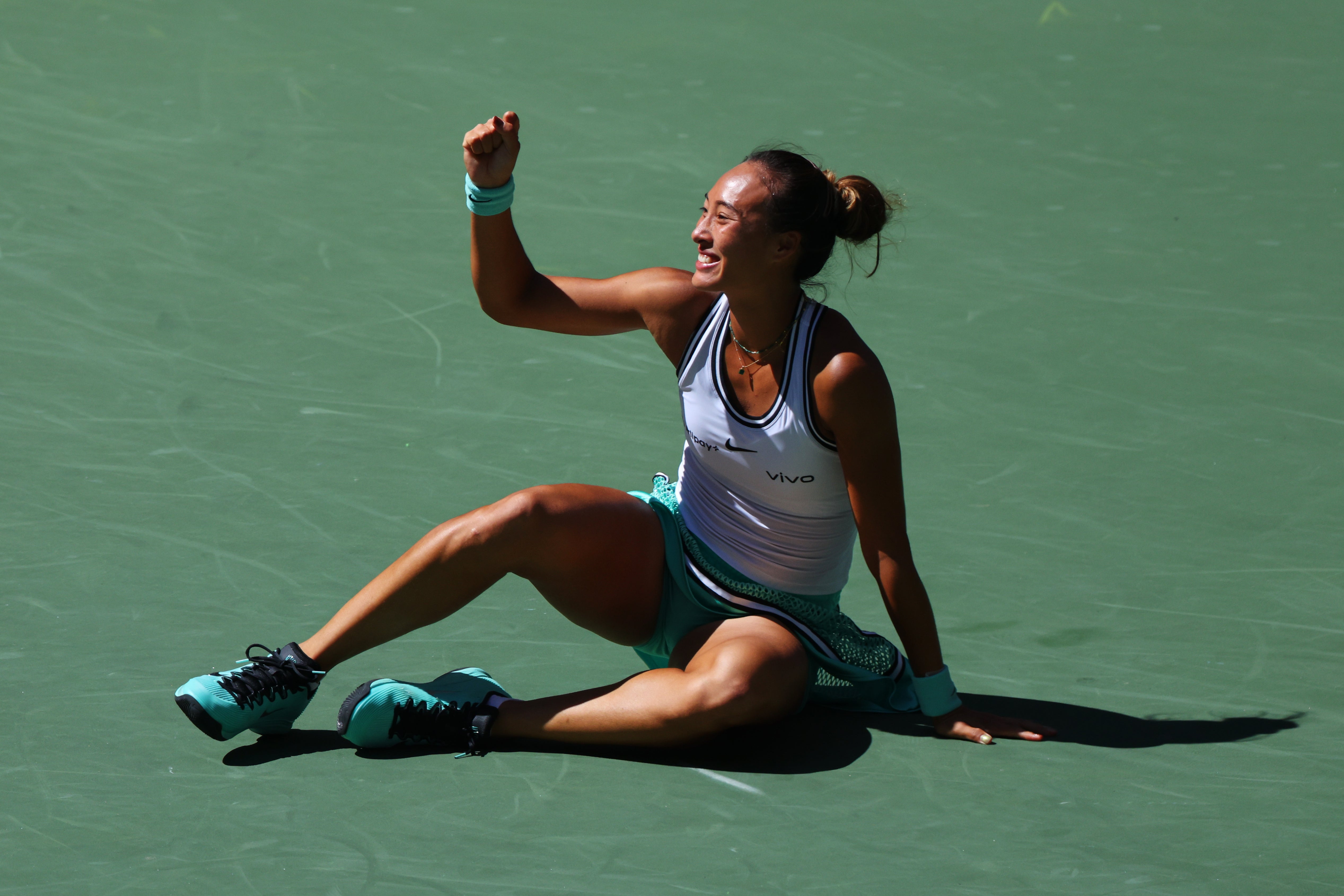 Qinwen Zheng celebrates her win (Andres Kudacki/AP)