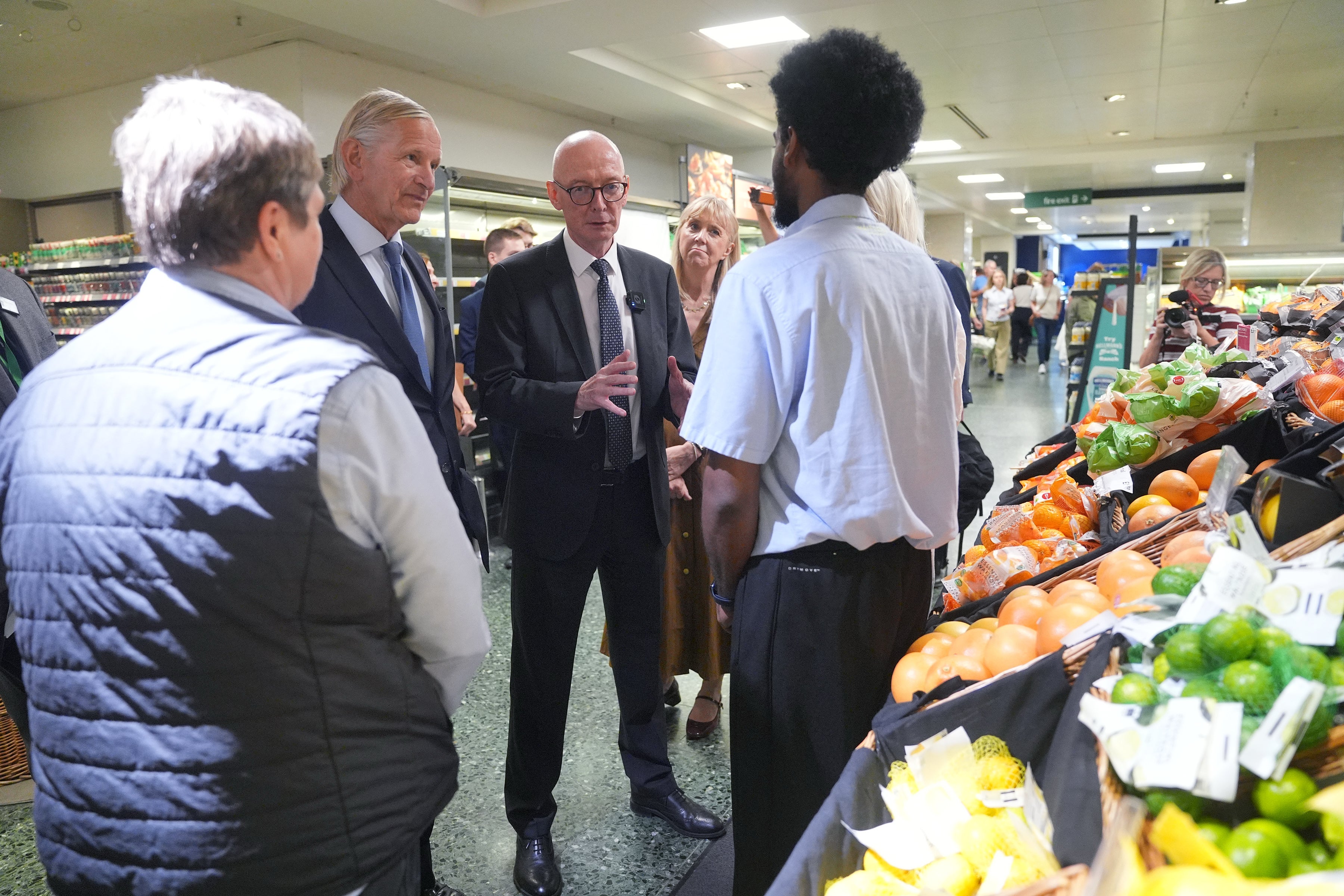 Work and Pensions Secretary Pat McFadden (centre) during a visit to John Lewis in London’s Oxford Street