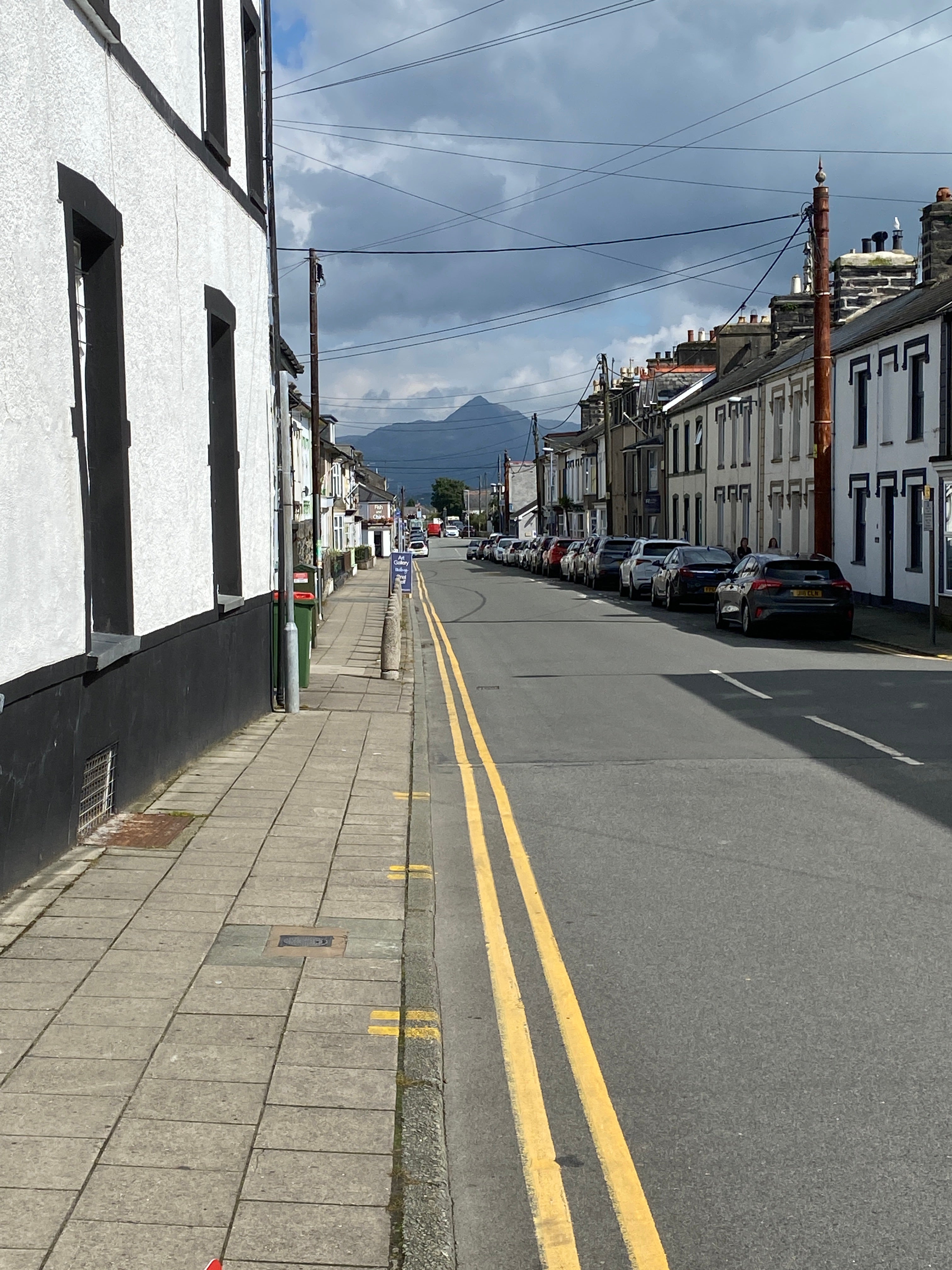 Yr Wyddfa (Snowdon) pictured from the village of Porthmadog