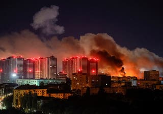 Smoke rises in the city during a Russian missile strike in Kyiv
