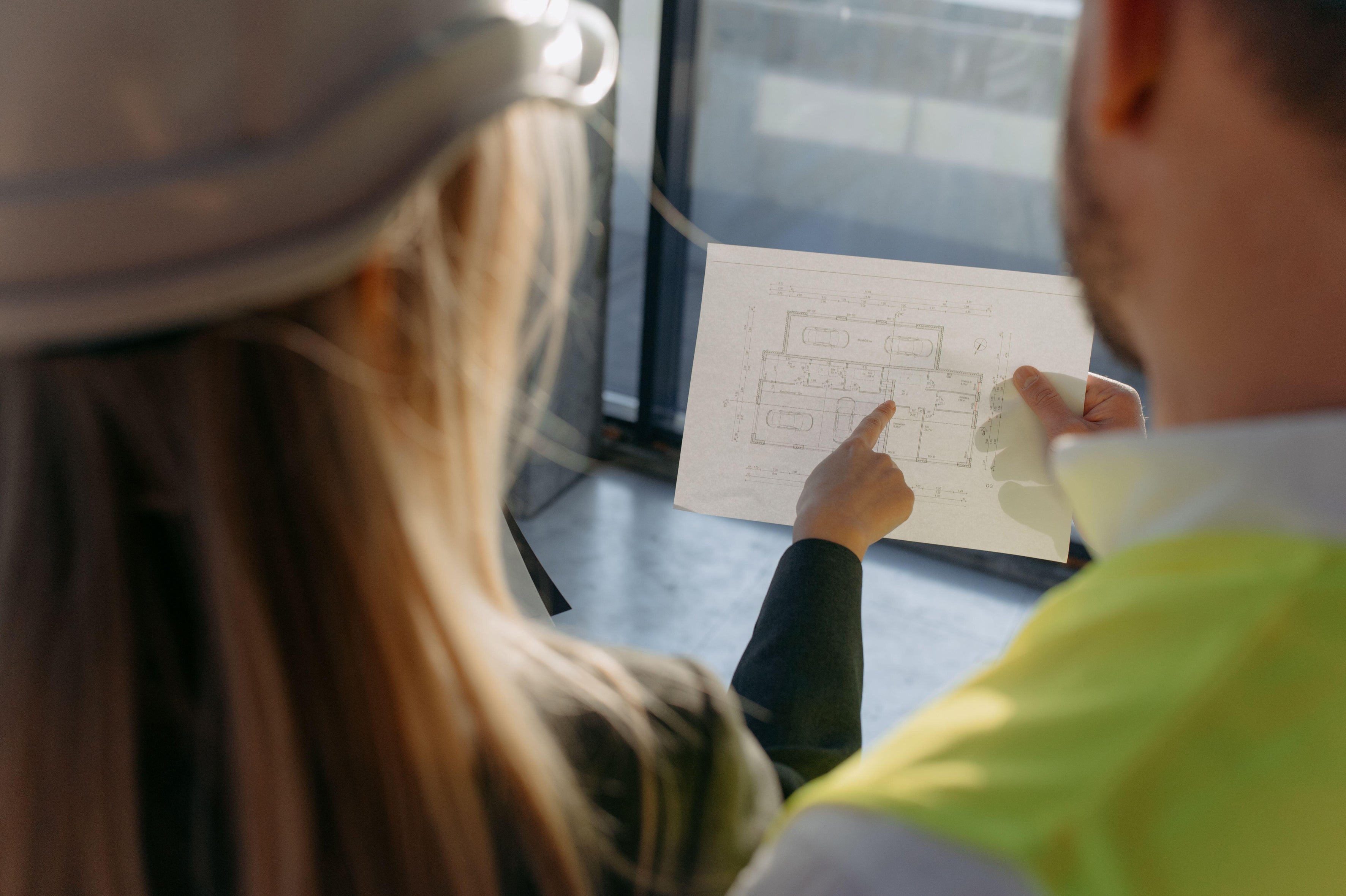 A couple studying a house project (Alamy/PA)