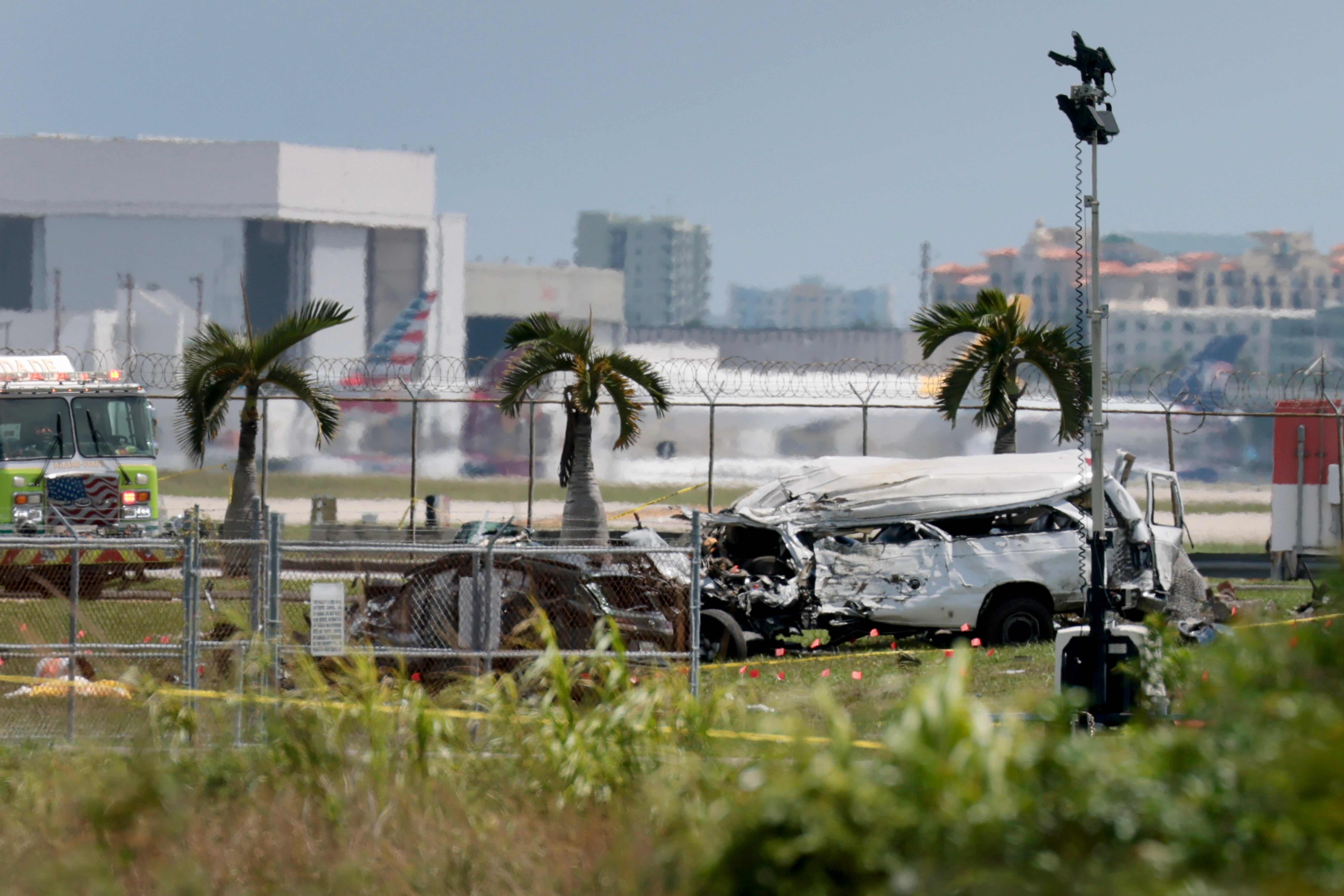 The five victims were in vehicles on the ground, including a van on an airport service road and an SUV outside airport property