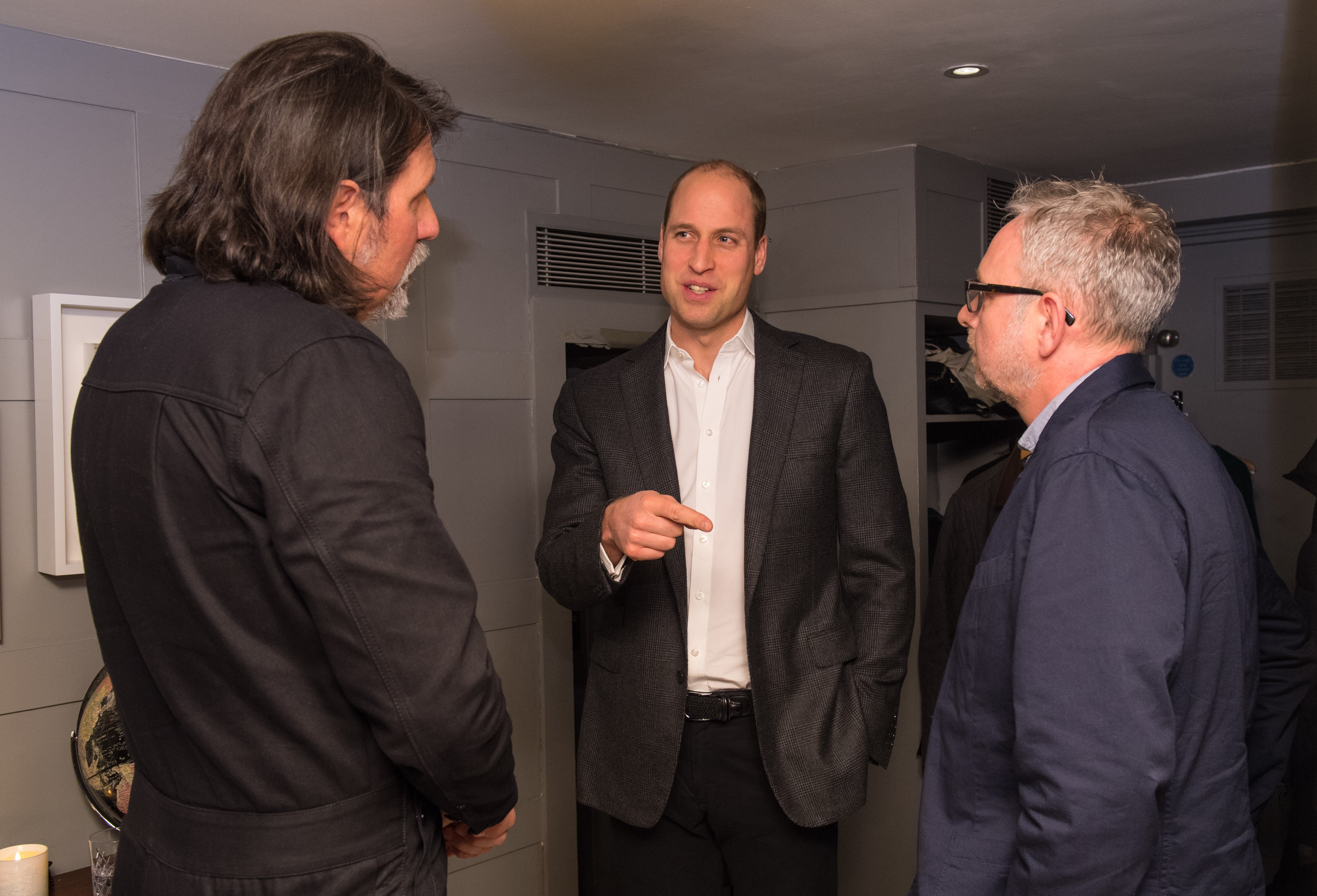 CALM chief executive Simon Gunning, right, with CALM chair James Scroggs, left, and the Prince of Wales