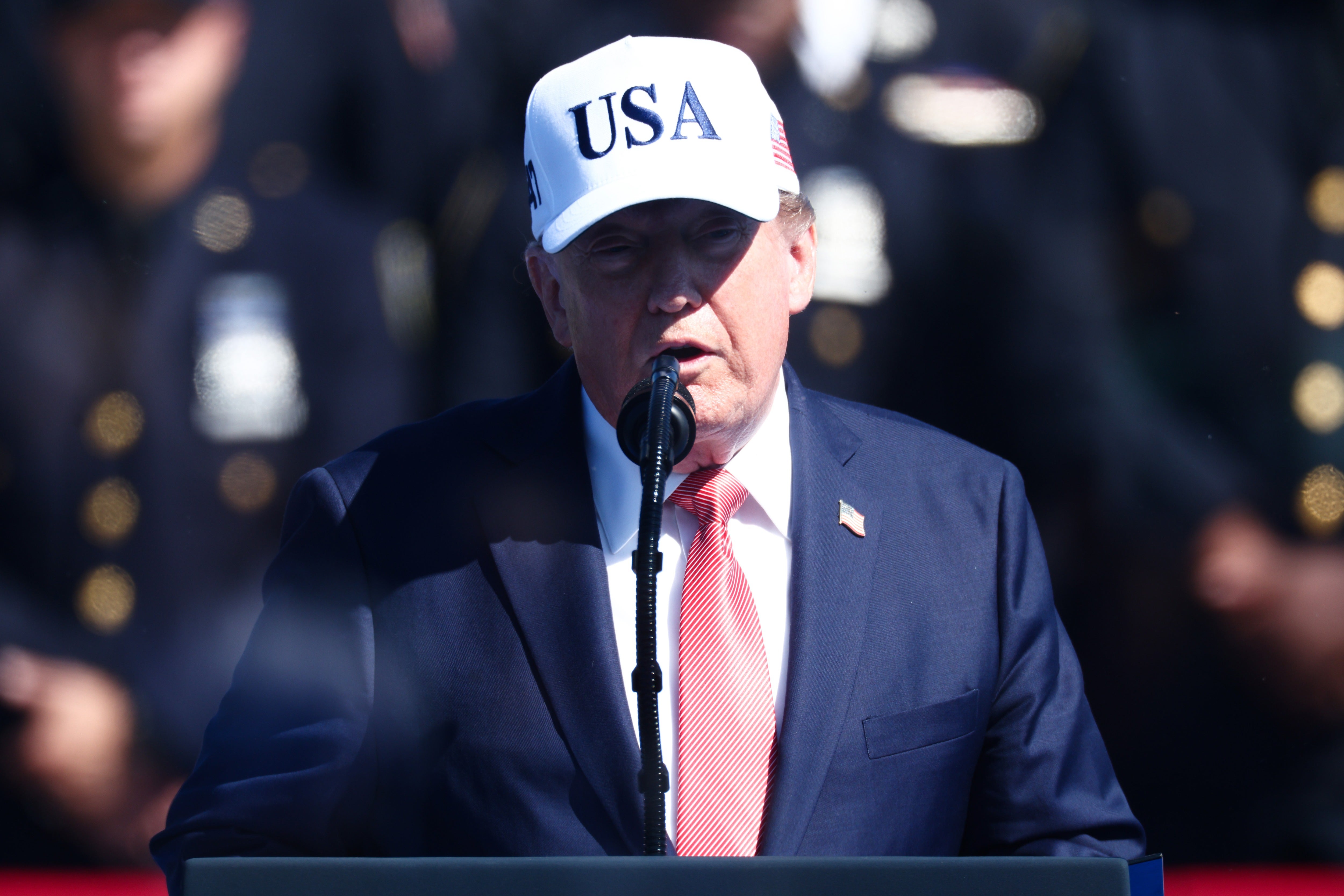 Trump said during a speech on the Ellipse in Washington, D.C., Tuesday he had been dragged to safety by the men, who feared a building was about to come down on top of them (Getty)