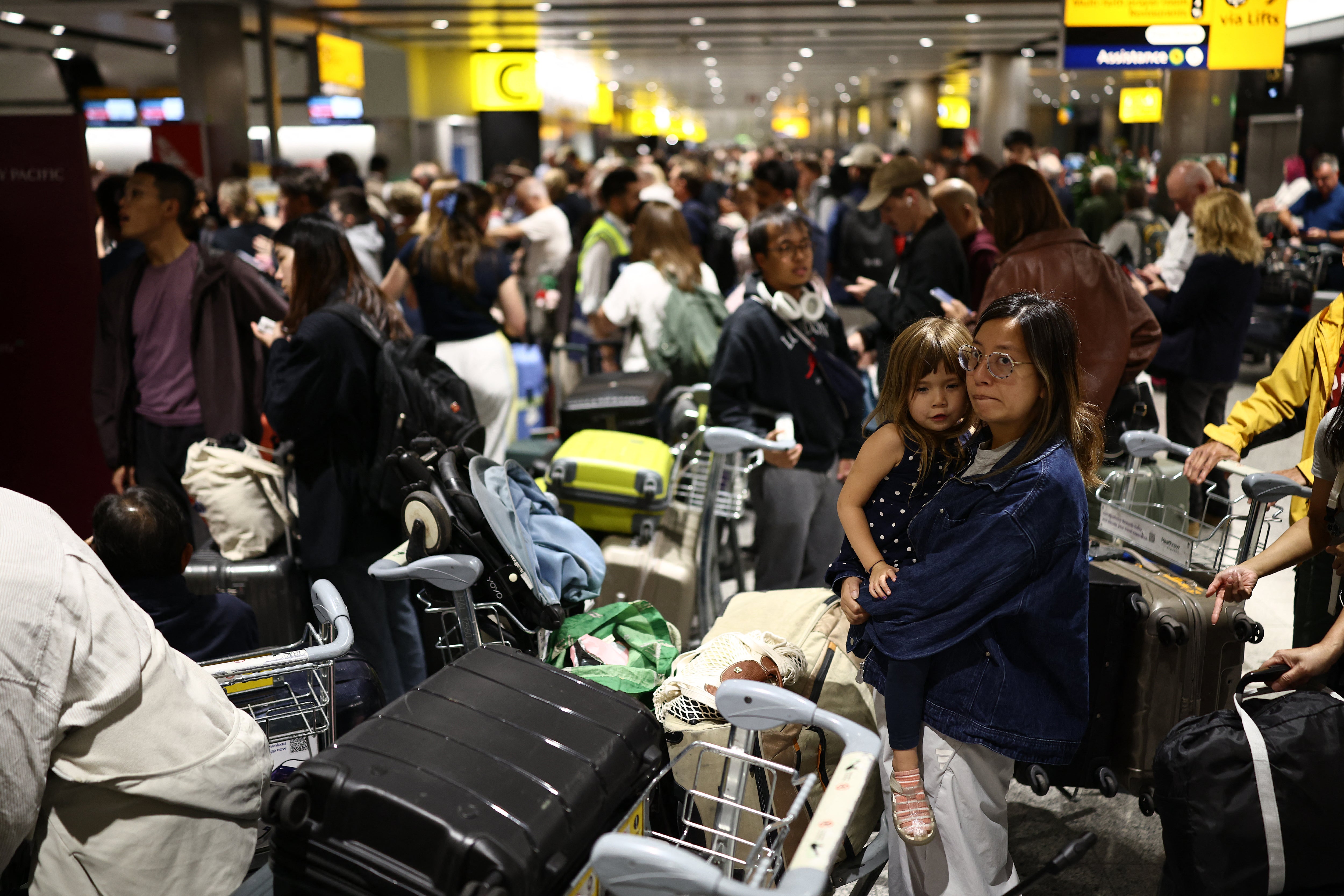 Delayed passengers at Terminal 3 of London Heathrow
