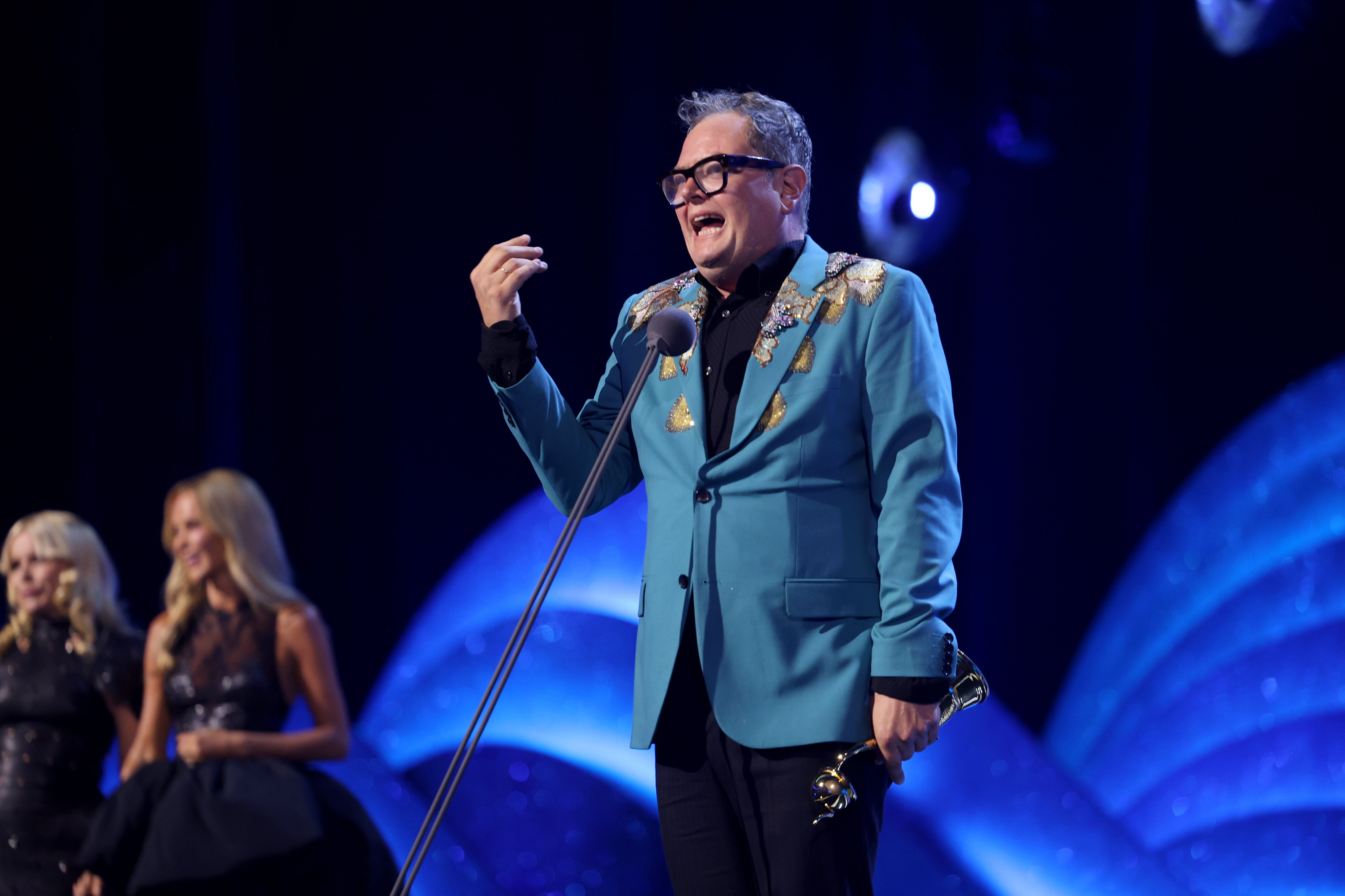 Alan Carr fights back tears after being honoured with surprise National Television Award