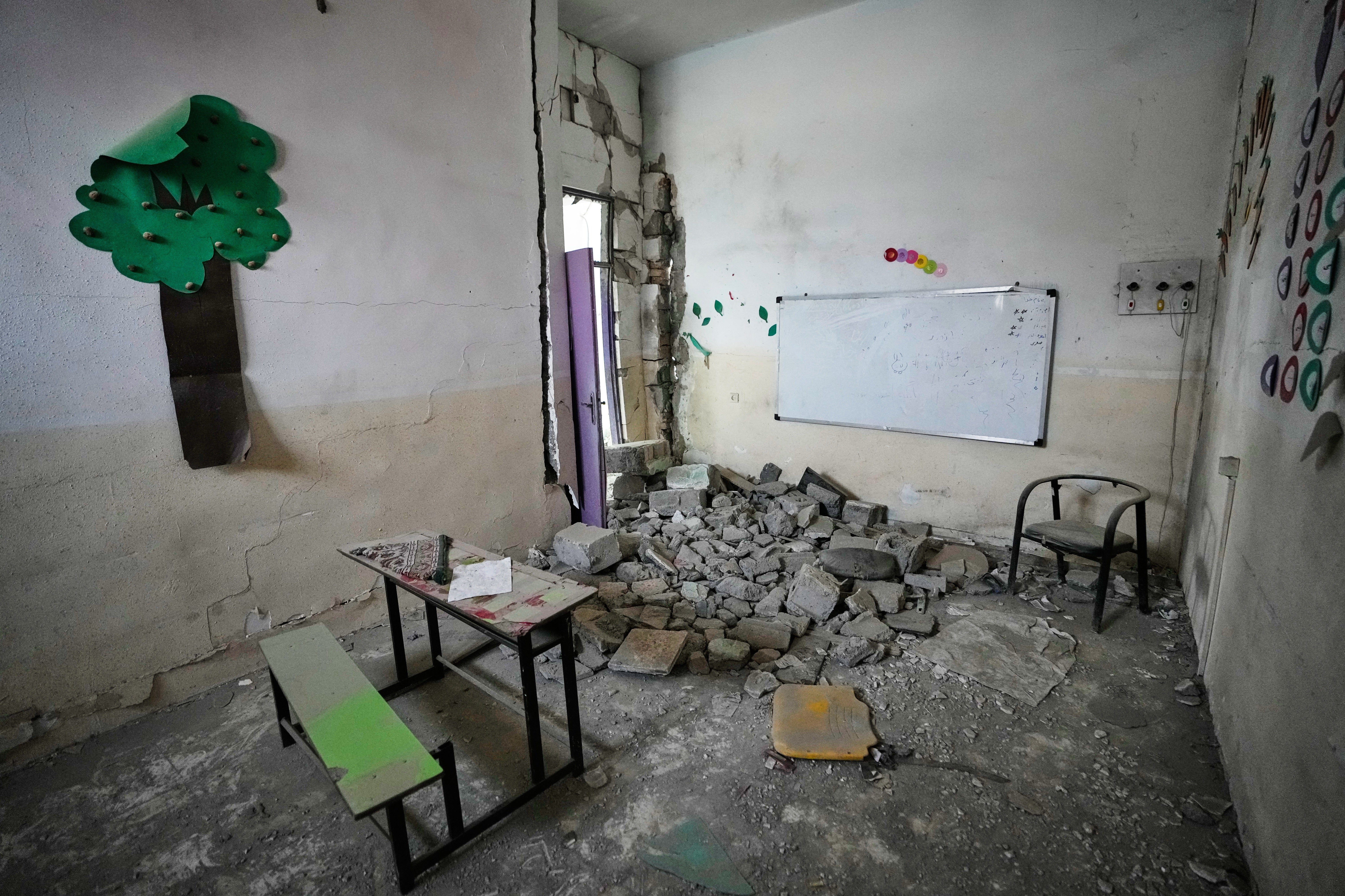 Photos show what remains of an Iranian school where some 120 children died in a U.S. strike