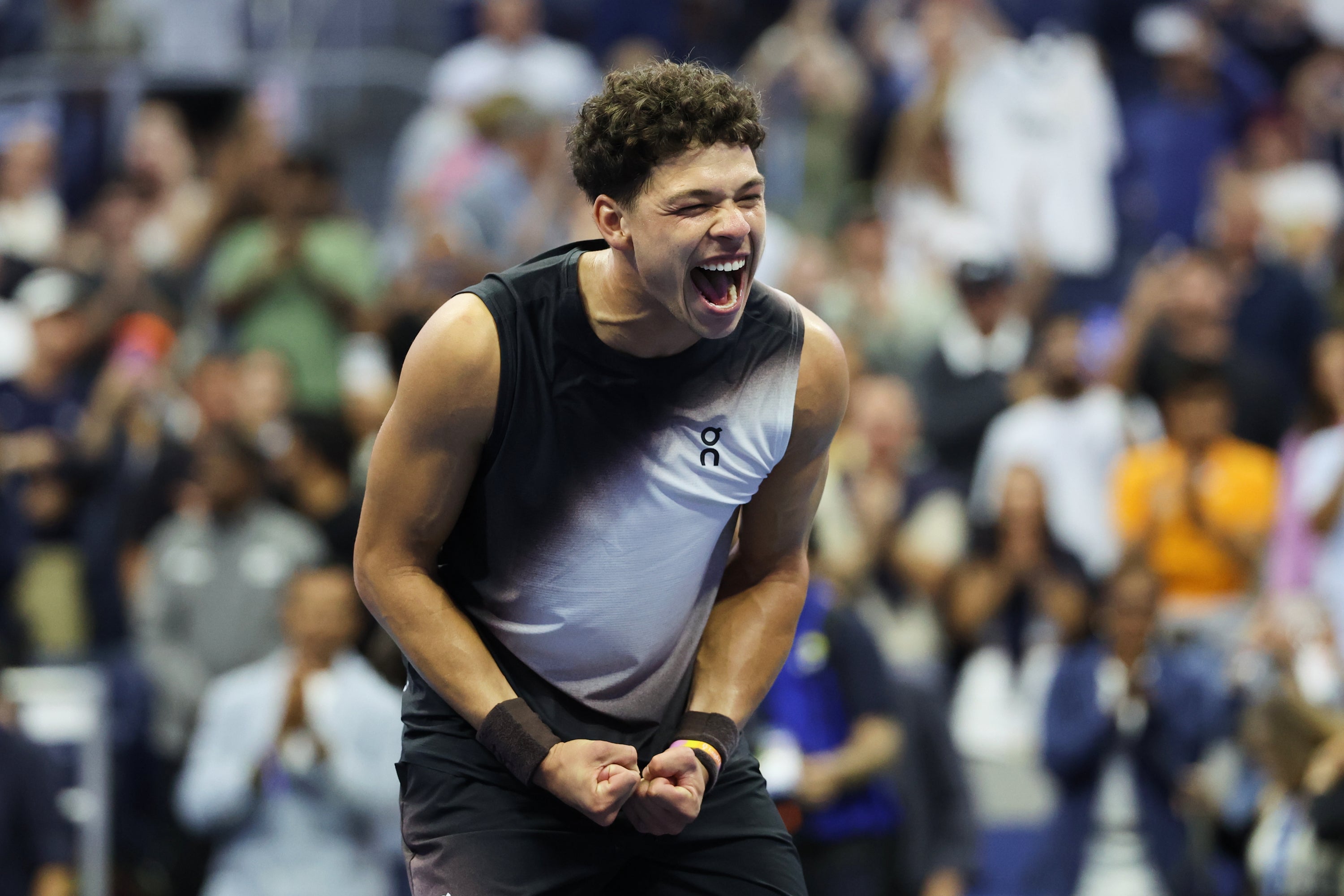 Ben Shelton celebrates after winning against Carlos Alcaraz in the US Open