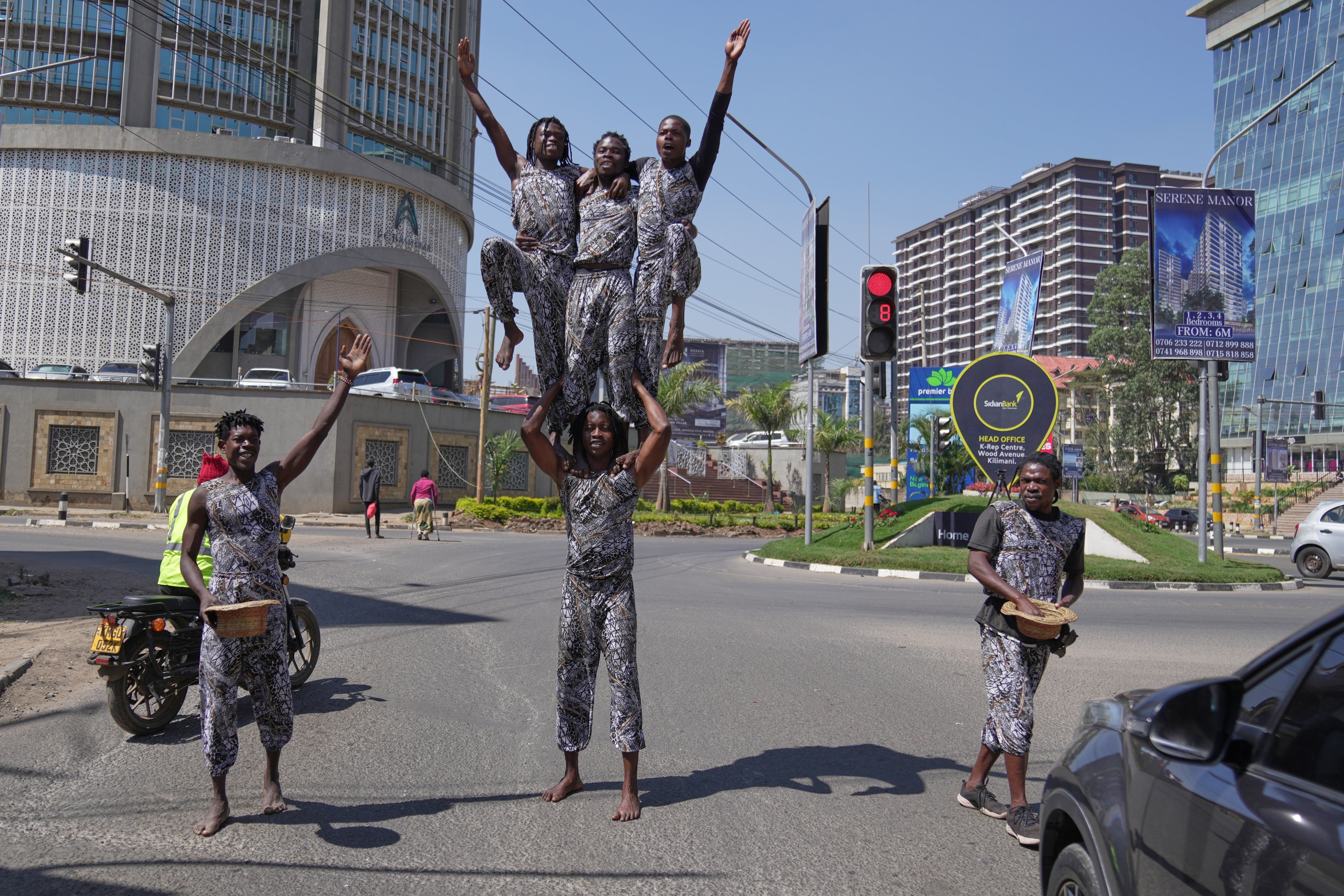 Meet the Nairobi acrobats turning Kenyan traffic jams into a livelihood