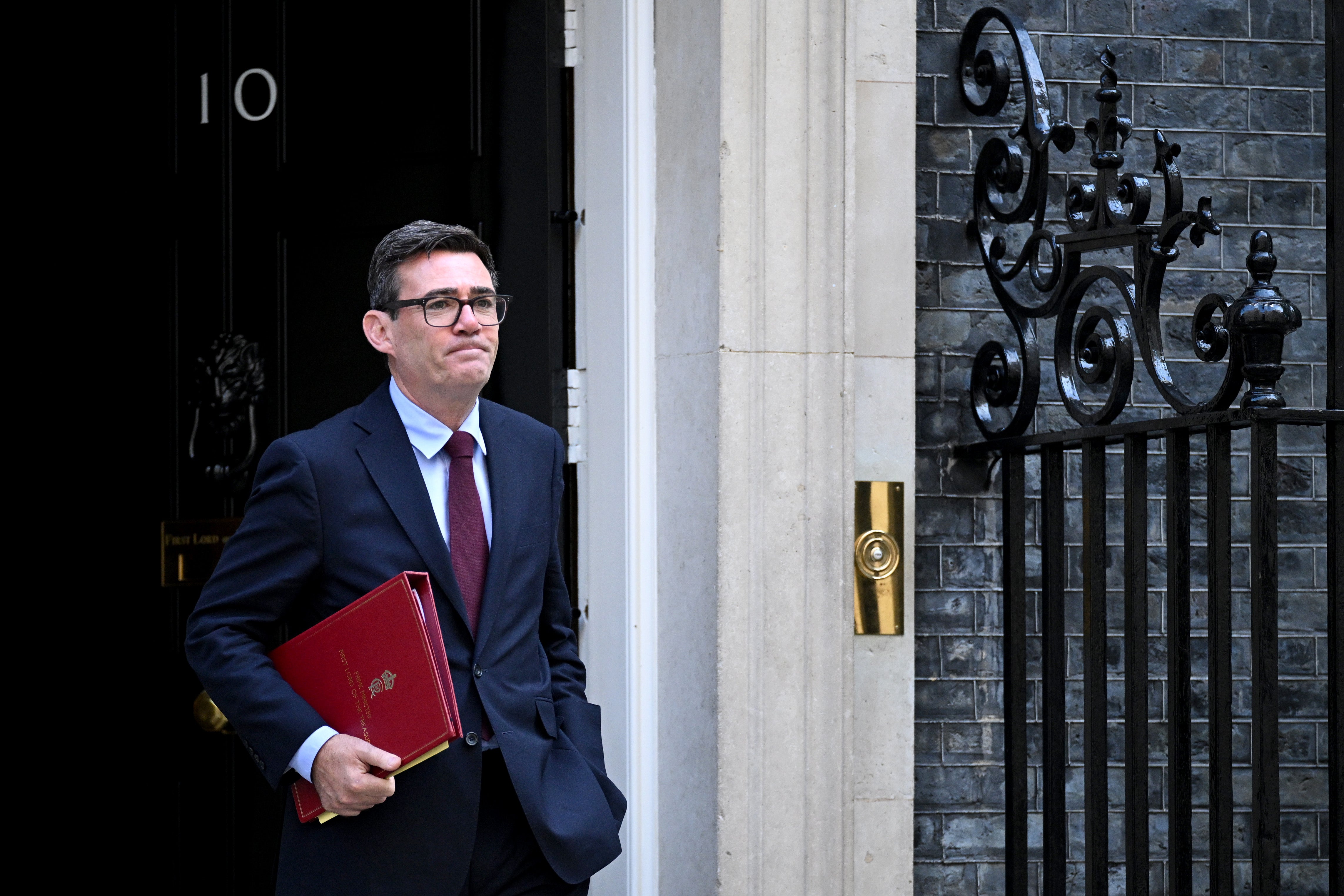 Andy Burnham departs 10 Downing Street to attend PMQs (Getty)
