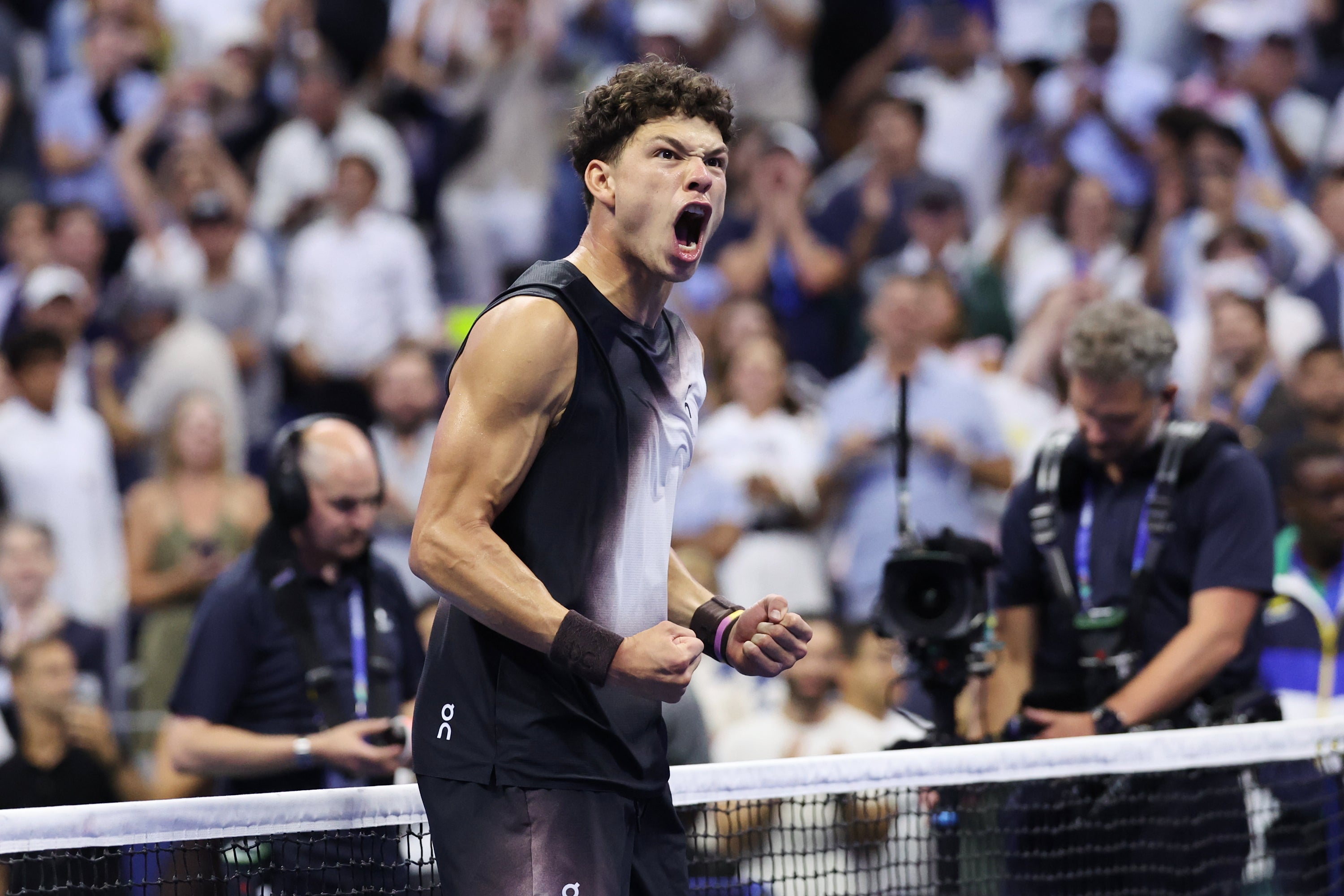 Ben Shelton celebrates after knocking Carlos Alcaraz out of the US Open