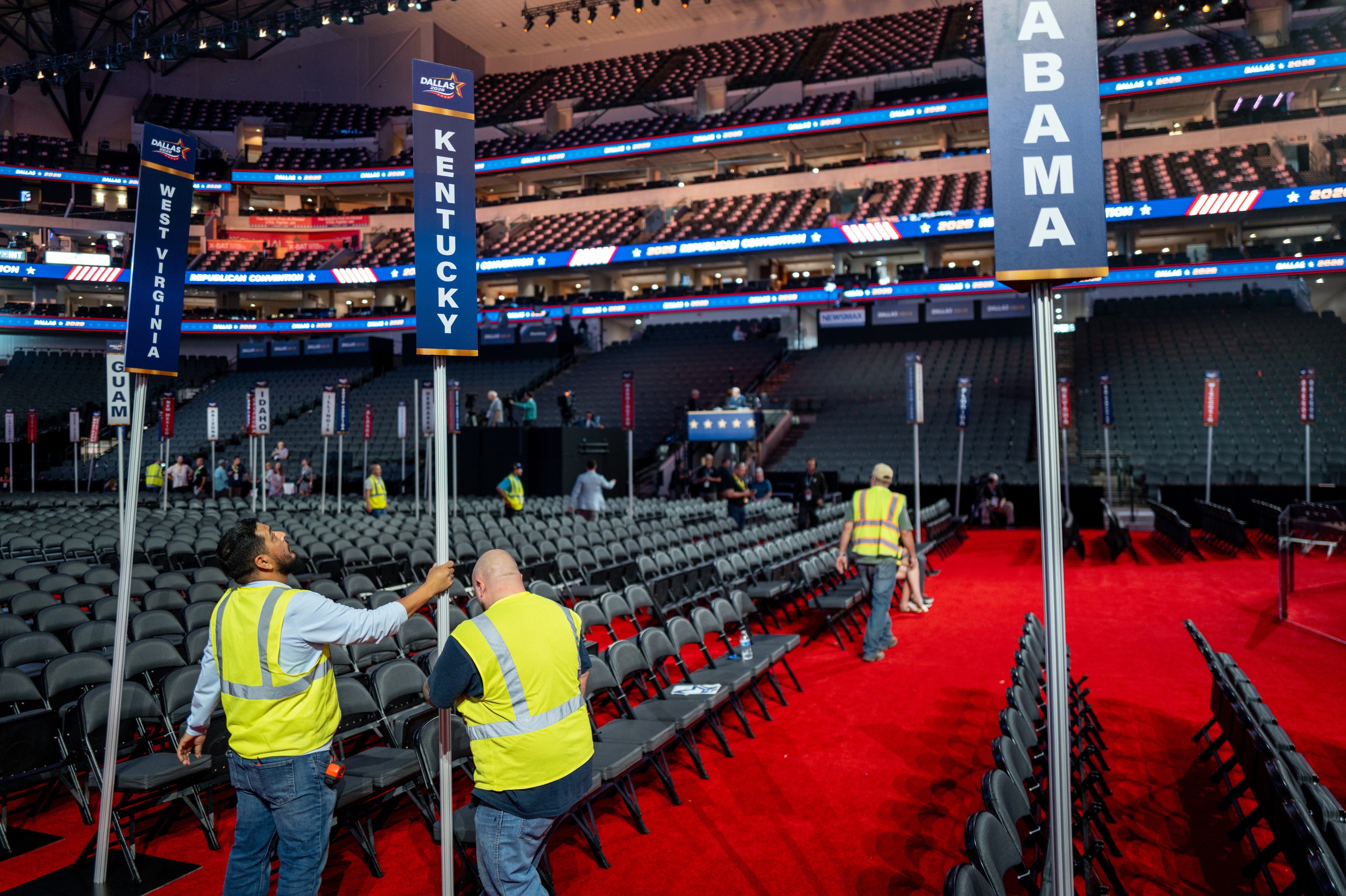 Workers make preparations ahead of the 2026 Republican National Convention at the American Airlines Center in Dallas