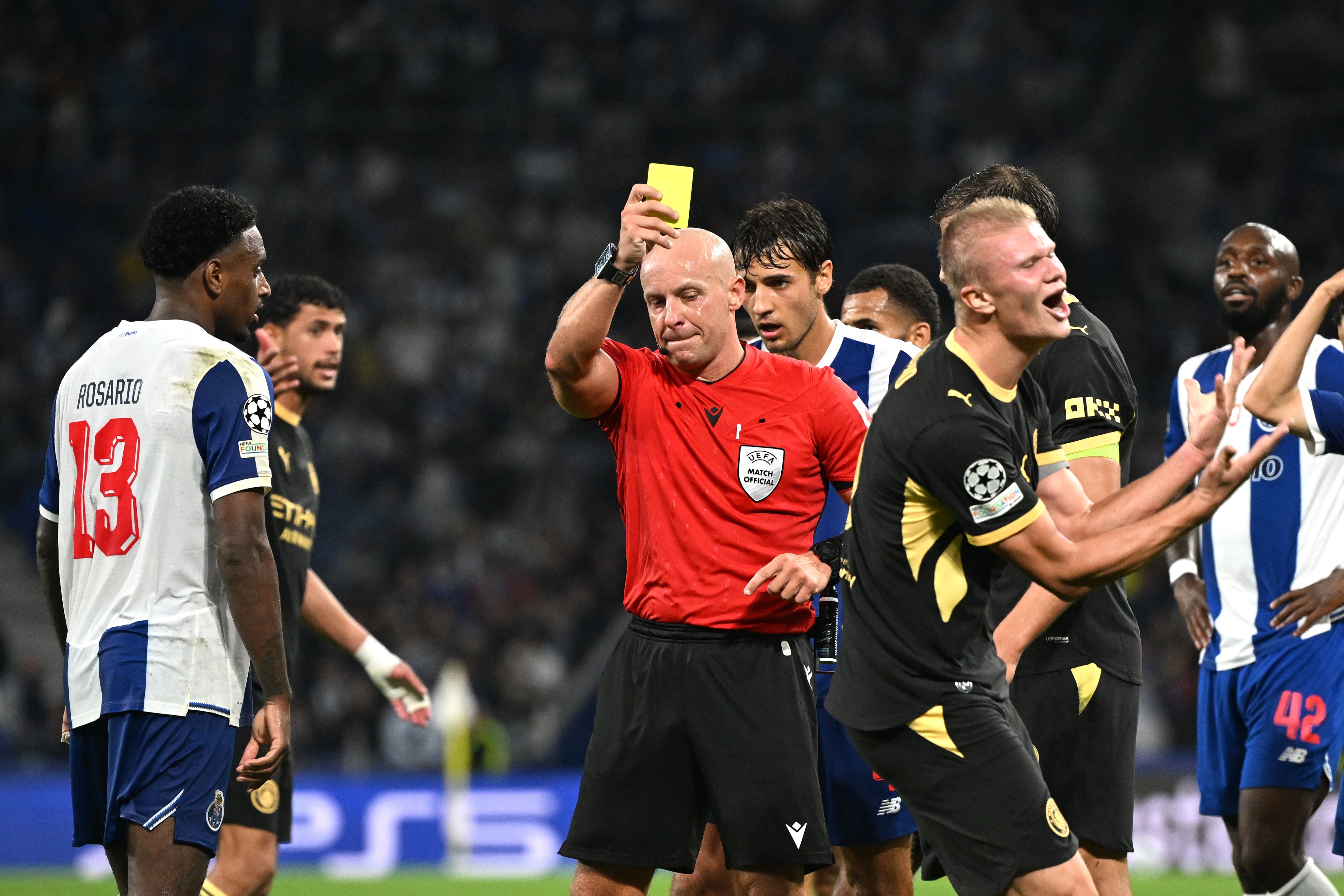 Haaland shows his disappointment after being booked