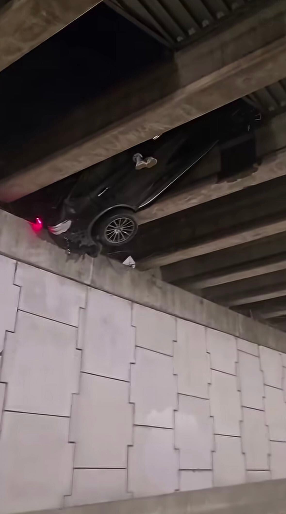 A car bizarrely got stuck under an overpass in Atlanta over the weekend — and no one knows how it happened