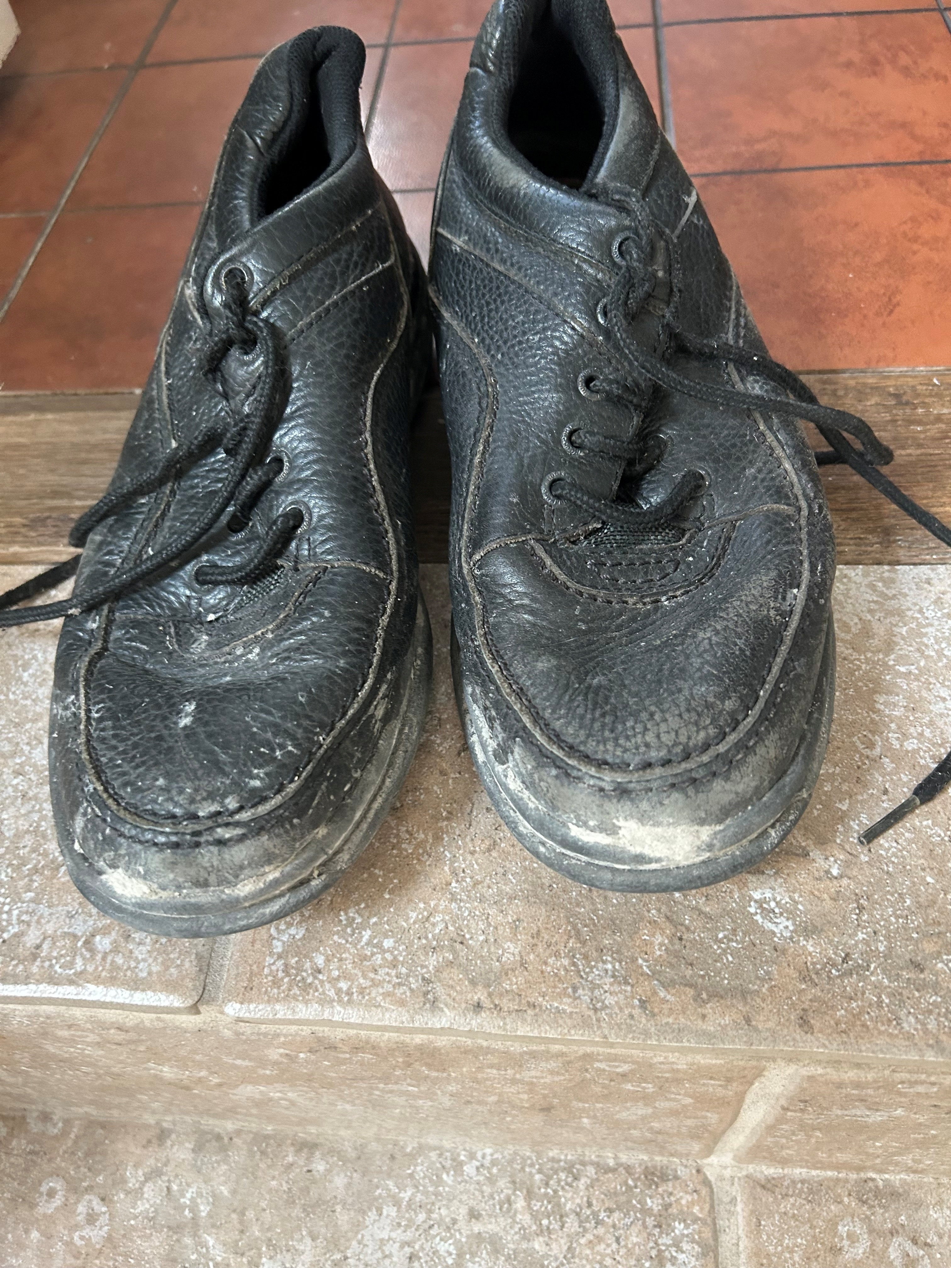 Shoes belonging to Holland that he wore at Ground Zero during a media tour with Bush on September 14, 2001