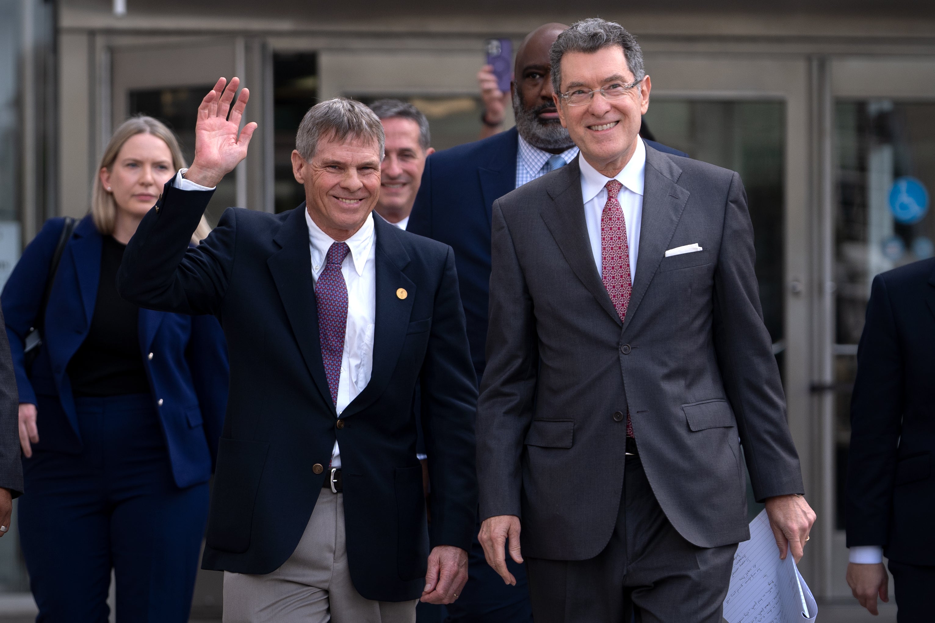 Hearn, left, and lawyer Norm Eisen, right, are anticipating a judge in DC to block prosecutors from ever charging Hearn again in connection with damage to the pool
