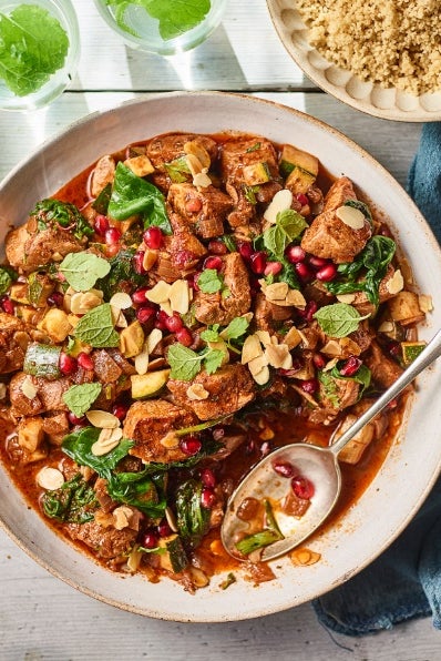 Chicken tagine with wholewheat couscous, almonds, pomegranate and plenty of herbs (Love Your Gut)