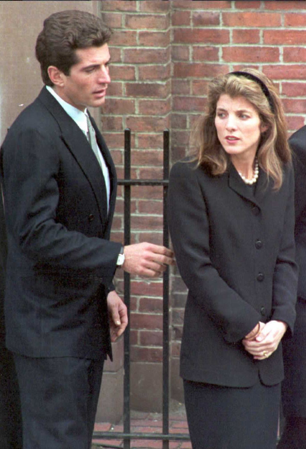 Kennedy with his sister Caroline (AFP via Getty Images)