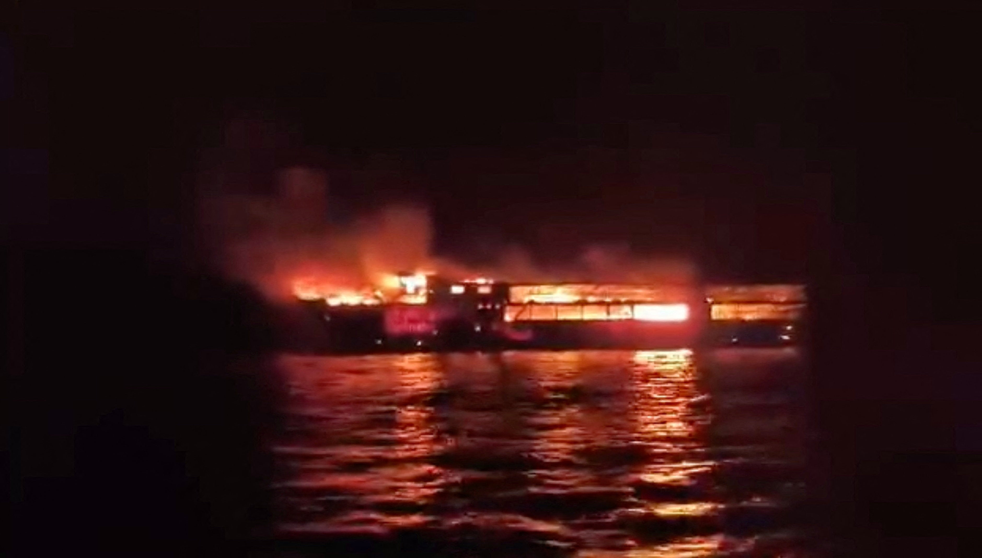 MV June Aster burns after a fire broke out on the ferry, off the coast of Palawan, Philippines (Reuters)