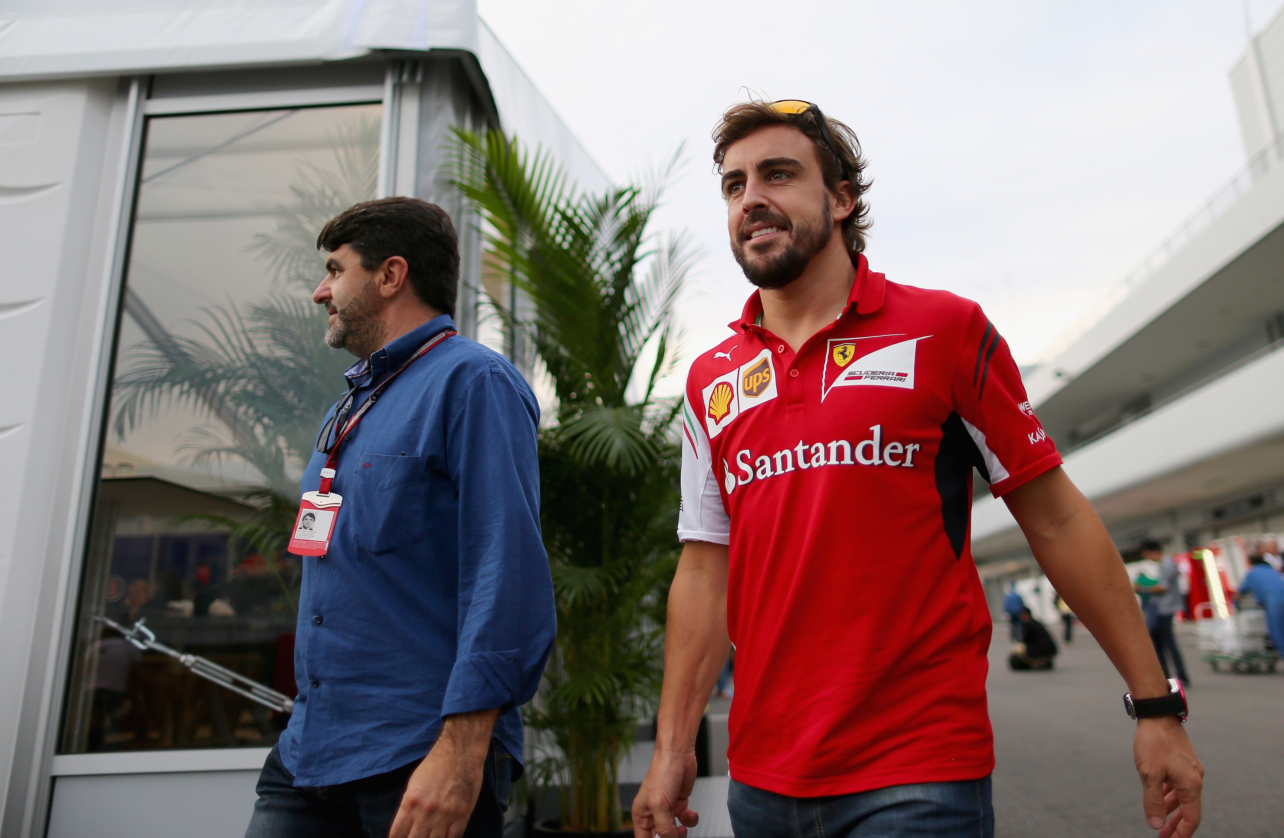 Luis Garcia Abad (left) is the long term agent of Fernando Alonso