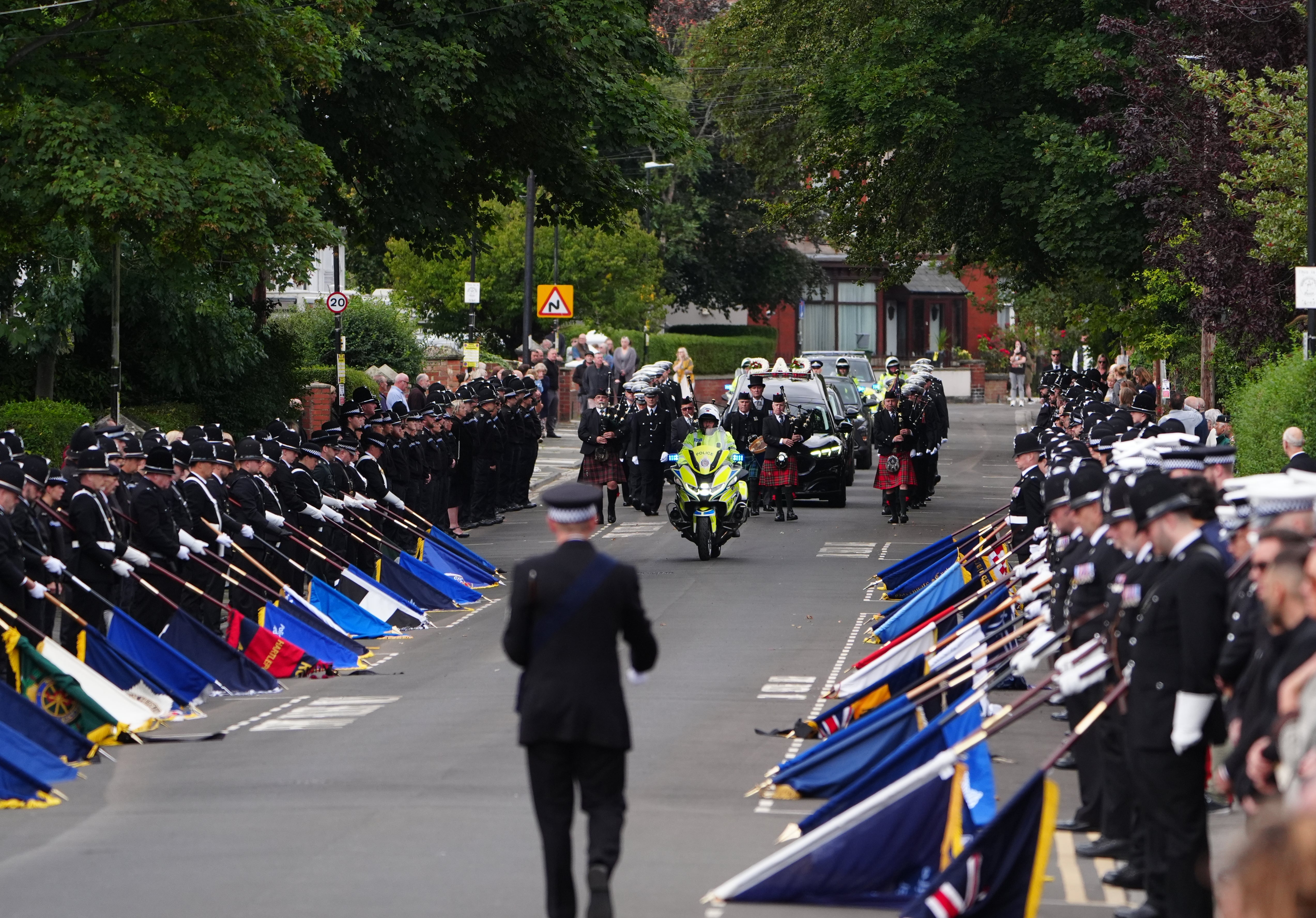 Streets lined with police colleagues at the ceremonial parade to the funeral of Pc Matthew Blades at St Joseph’s Roman Catholic Church in Hartlepool. (Owen Humphreys/PA)
