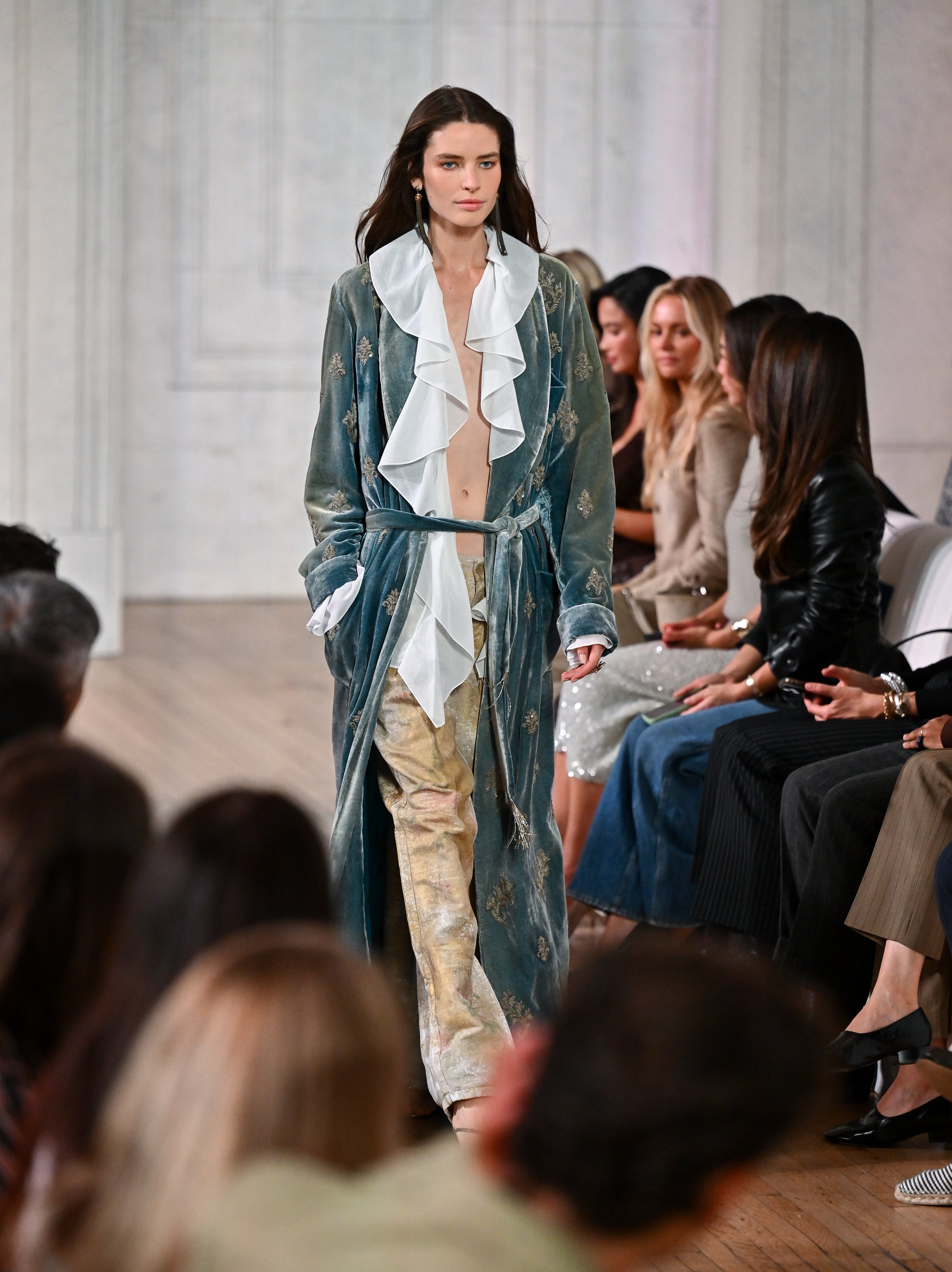 Flamboyant elements channelling the New Romantics were also seen in the collection (Evan Agostini/AP)