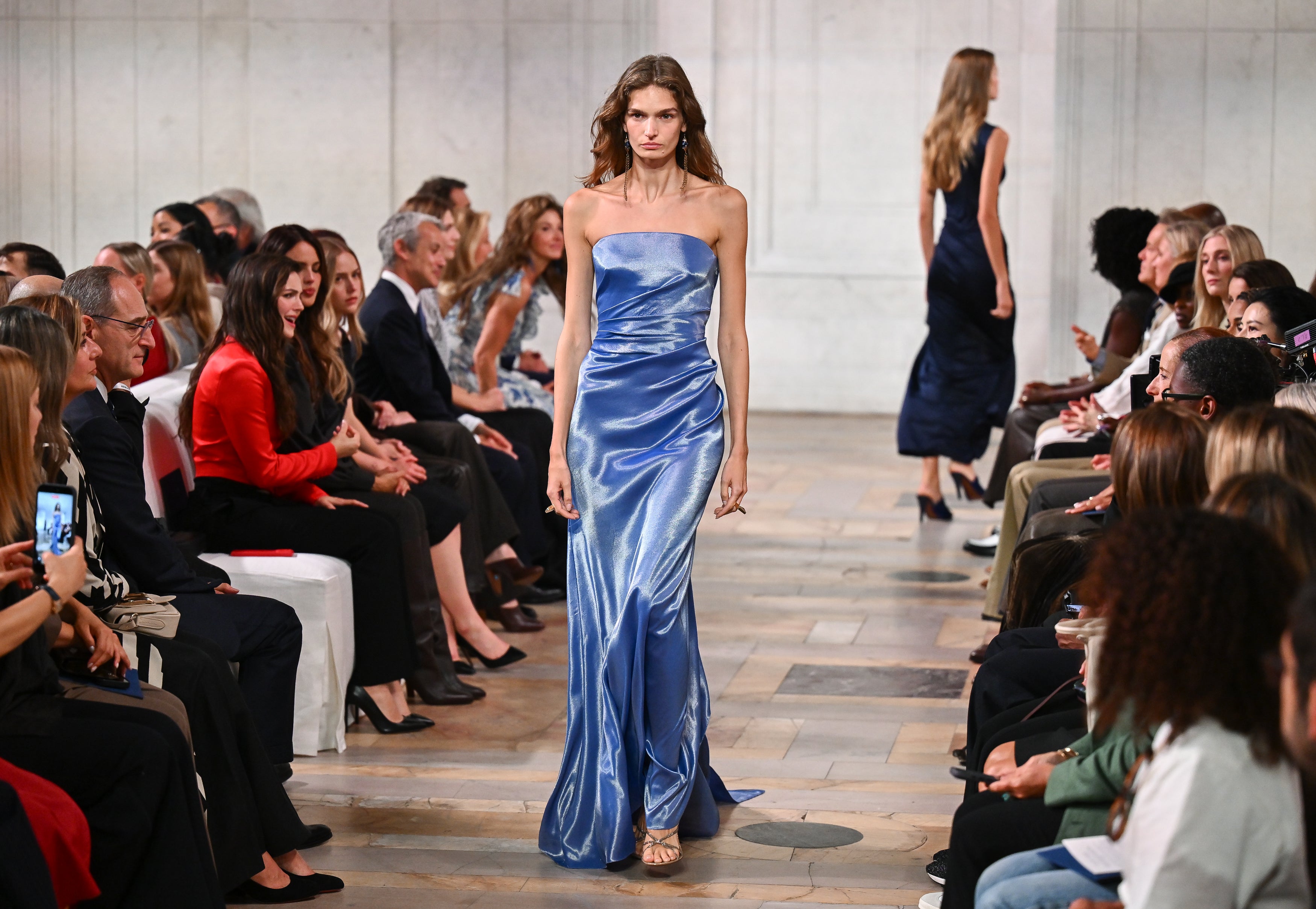 Slinky, almost liquid-looking materials made up much of the eveningwear (Evan Agostini/AP)