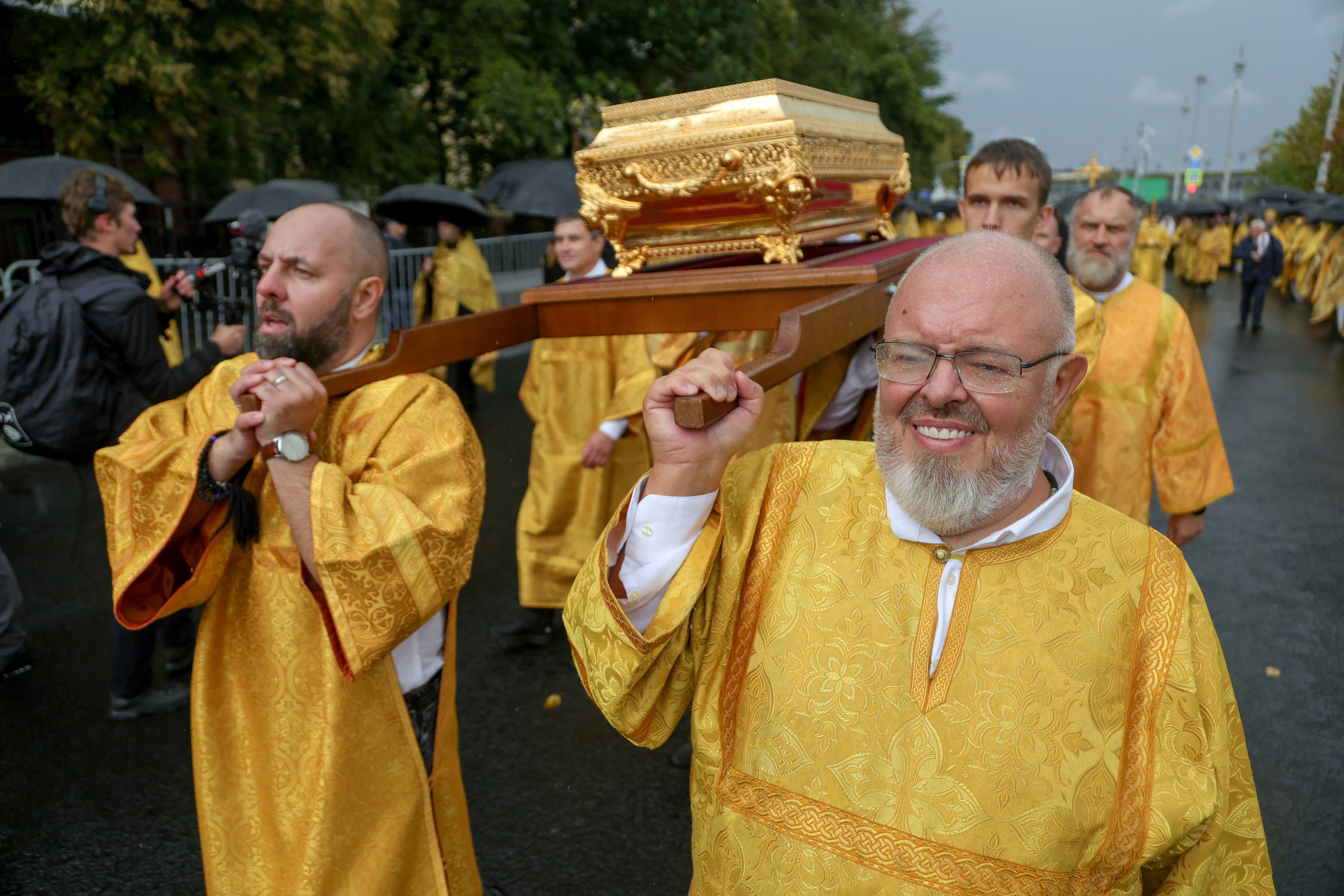 Bearers carry a case with relics of a medieval Russian prince Dmitry Donskoy during a citywide procession marking the Feast of the Moscow Saints in Moscow, Russia, September 6, 2026