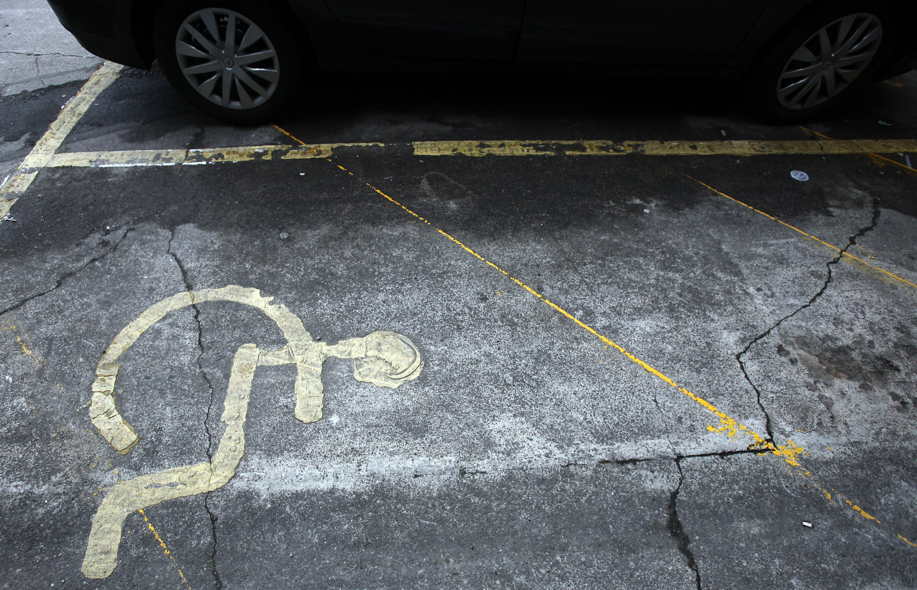 Because she did not have a blue badge she would be unable to park in the disabled bays without the permit