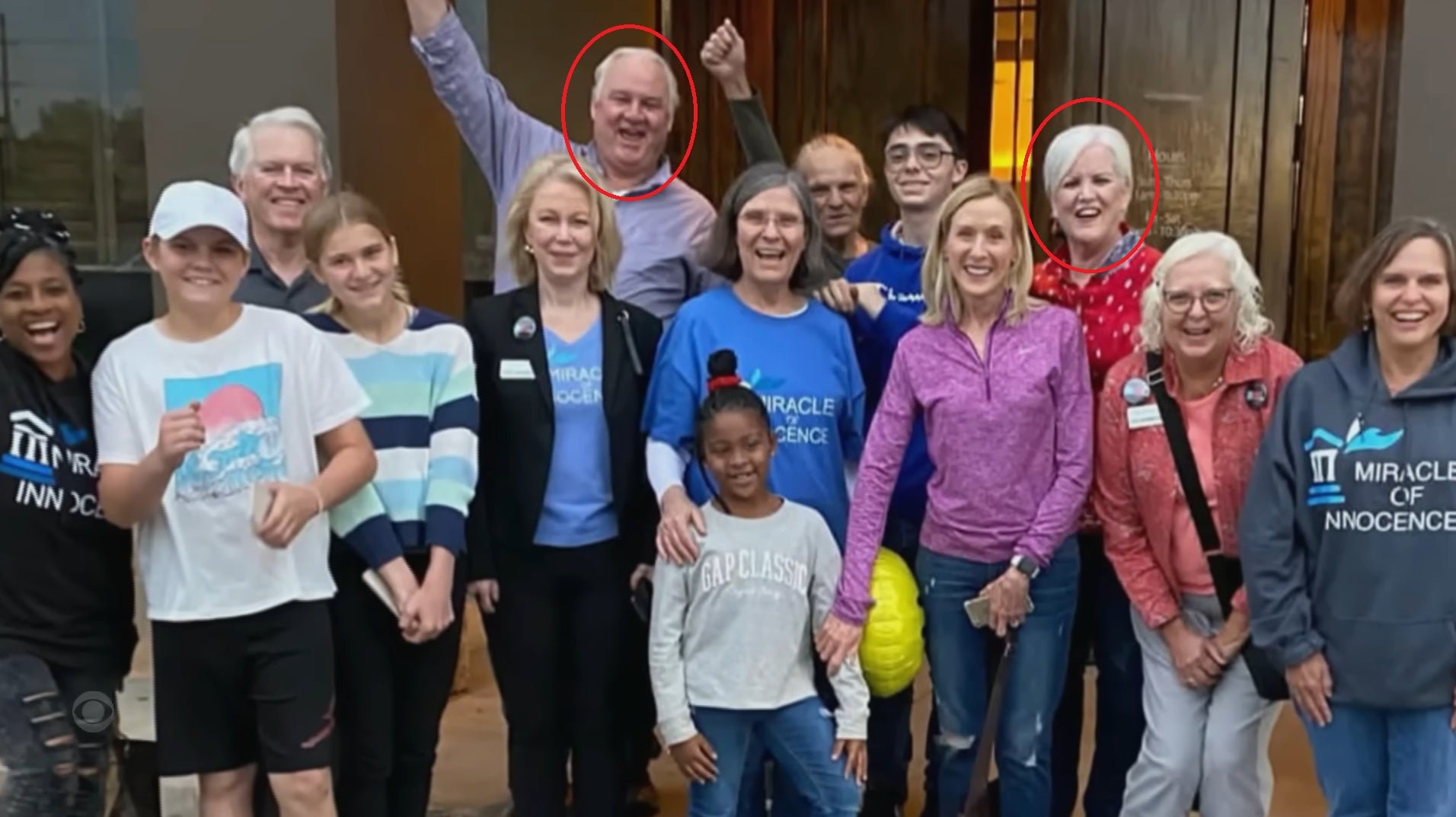 Dana Chandler poses for a photo with supporters, including the Umbehrs in the back row, after she was released on bond following the hung jury in her second trial