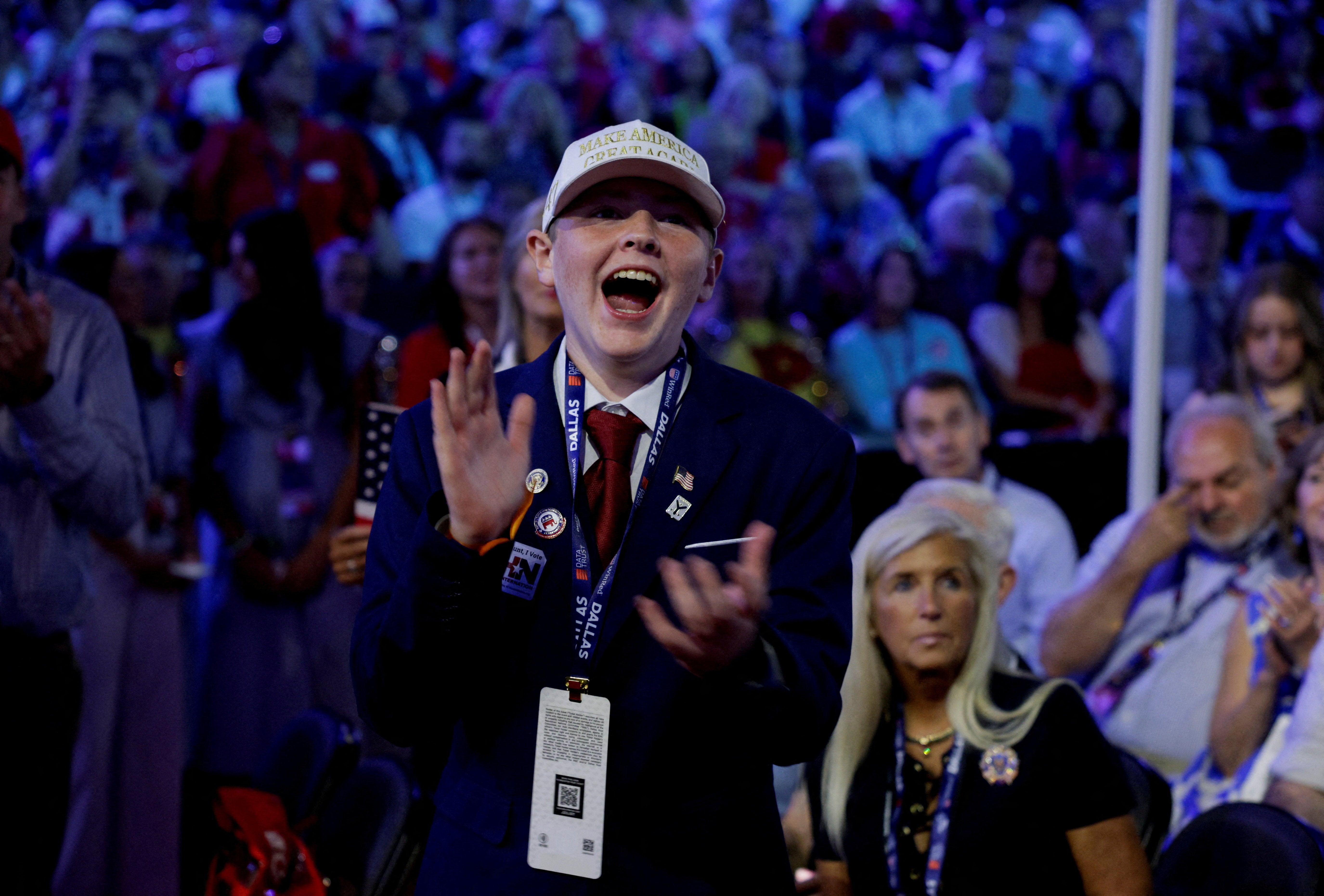 A supporter reacts during U.S. President Donald Trump's speech at the Republican National Midterm Convention in Dallas