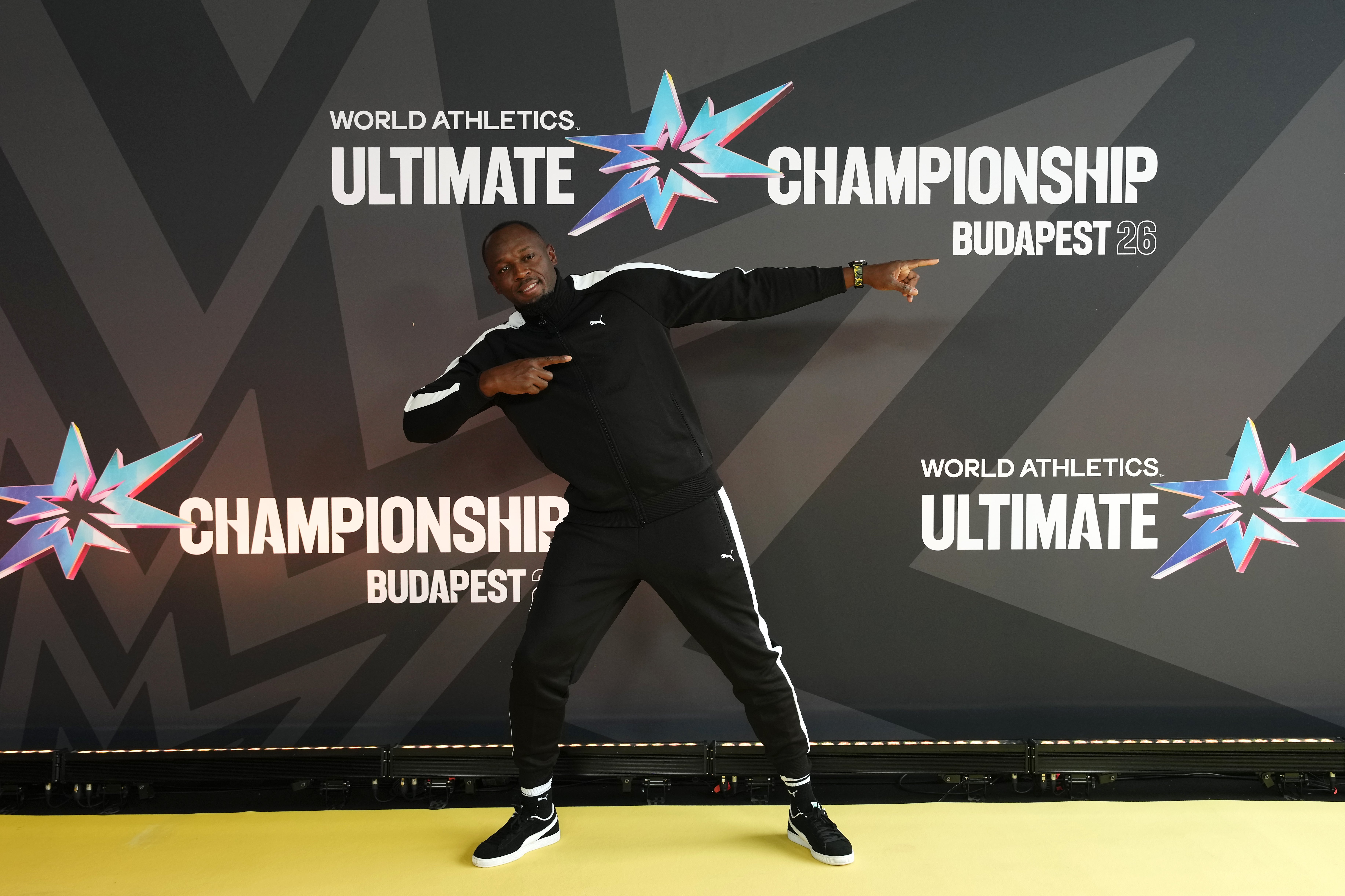 Usain Bolt poses for the cameras (Martin Rickett/PA).