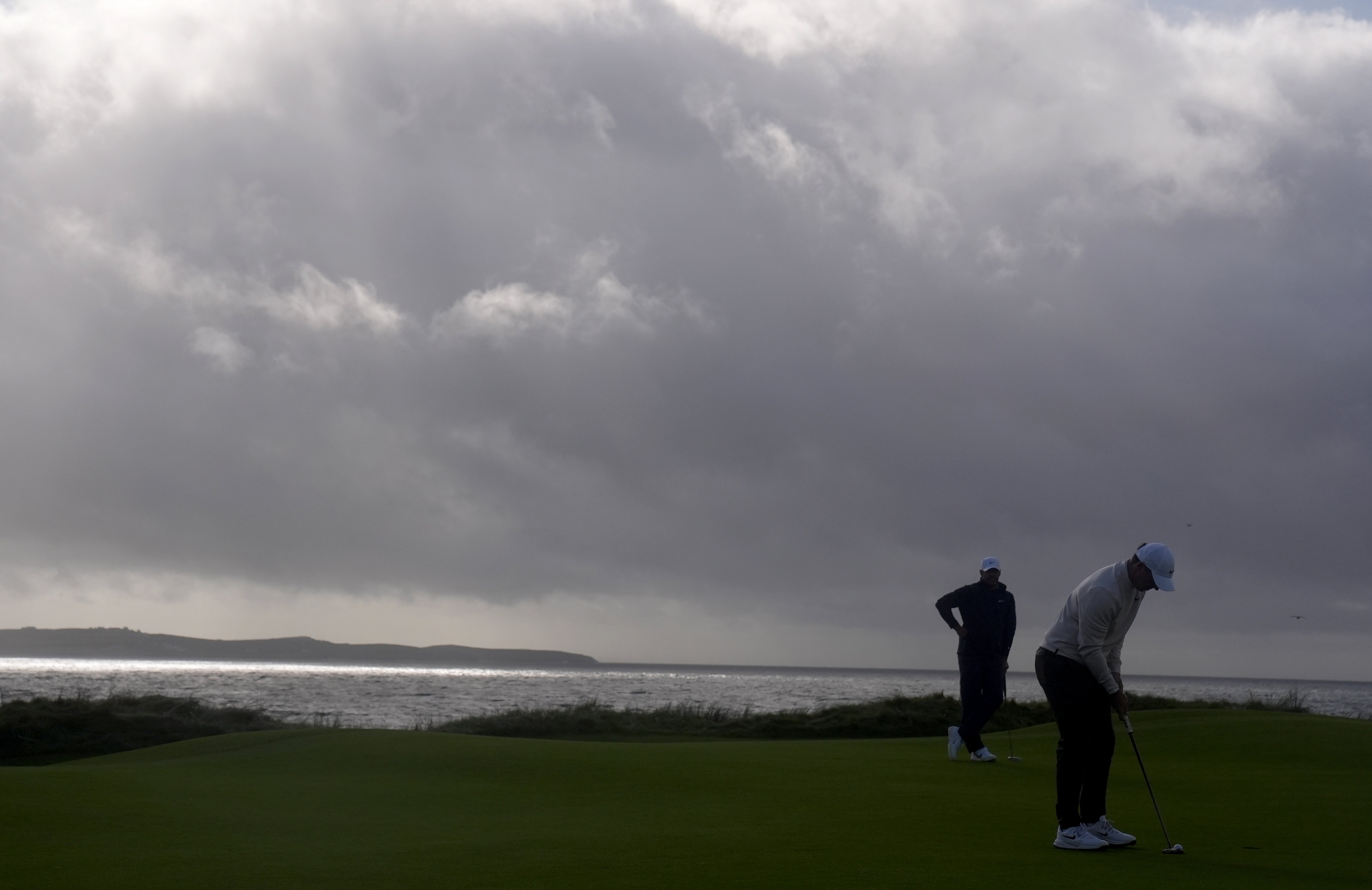 Rory McIlroy had to battle the elements through a tough opening day (Brian Lawless/PA)