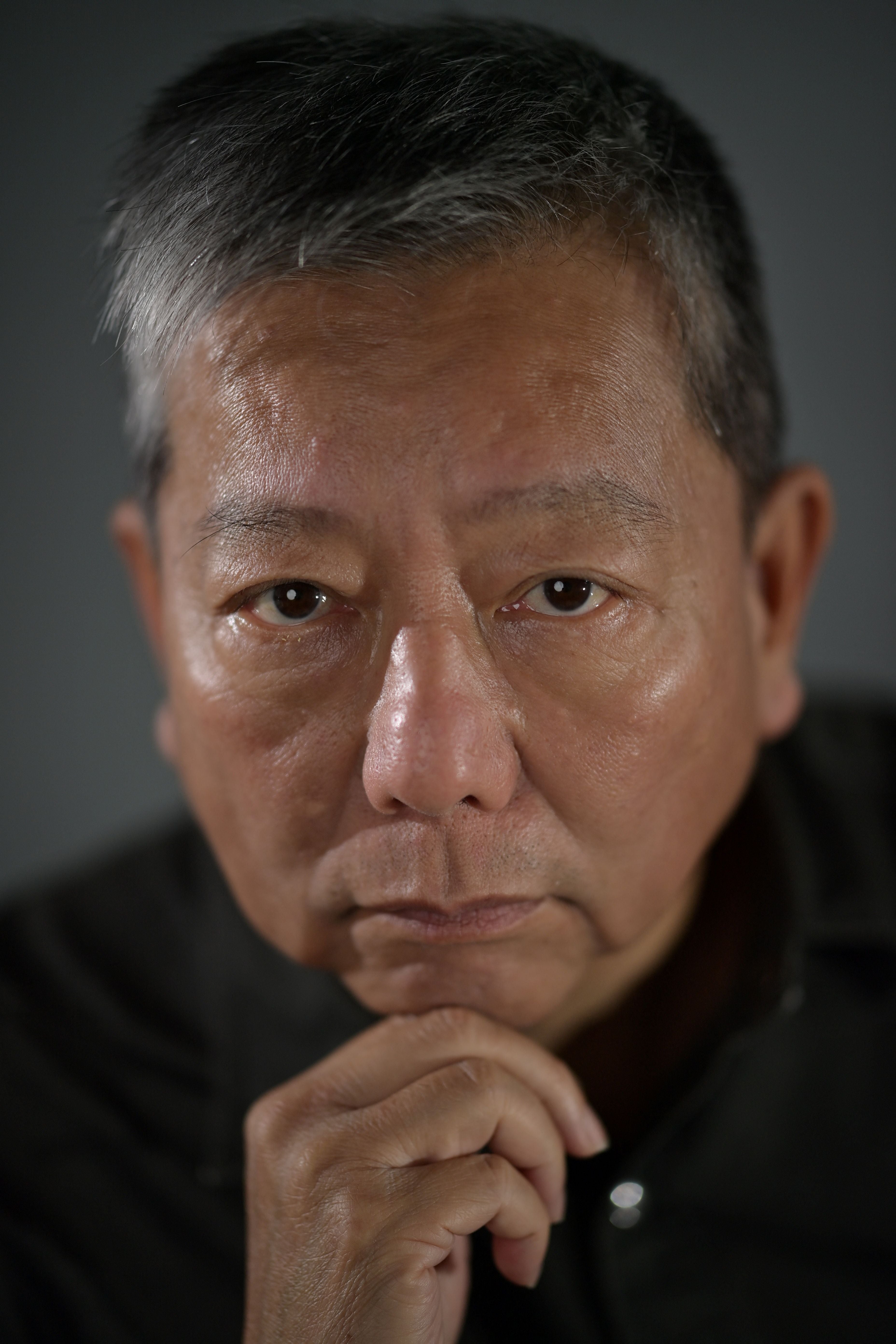 Hong Kong pro-democracy activist Lee Cheuk-yan poses during a photo session in Hong Kong on March 21, 2021 (AFP/Getty)