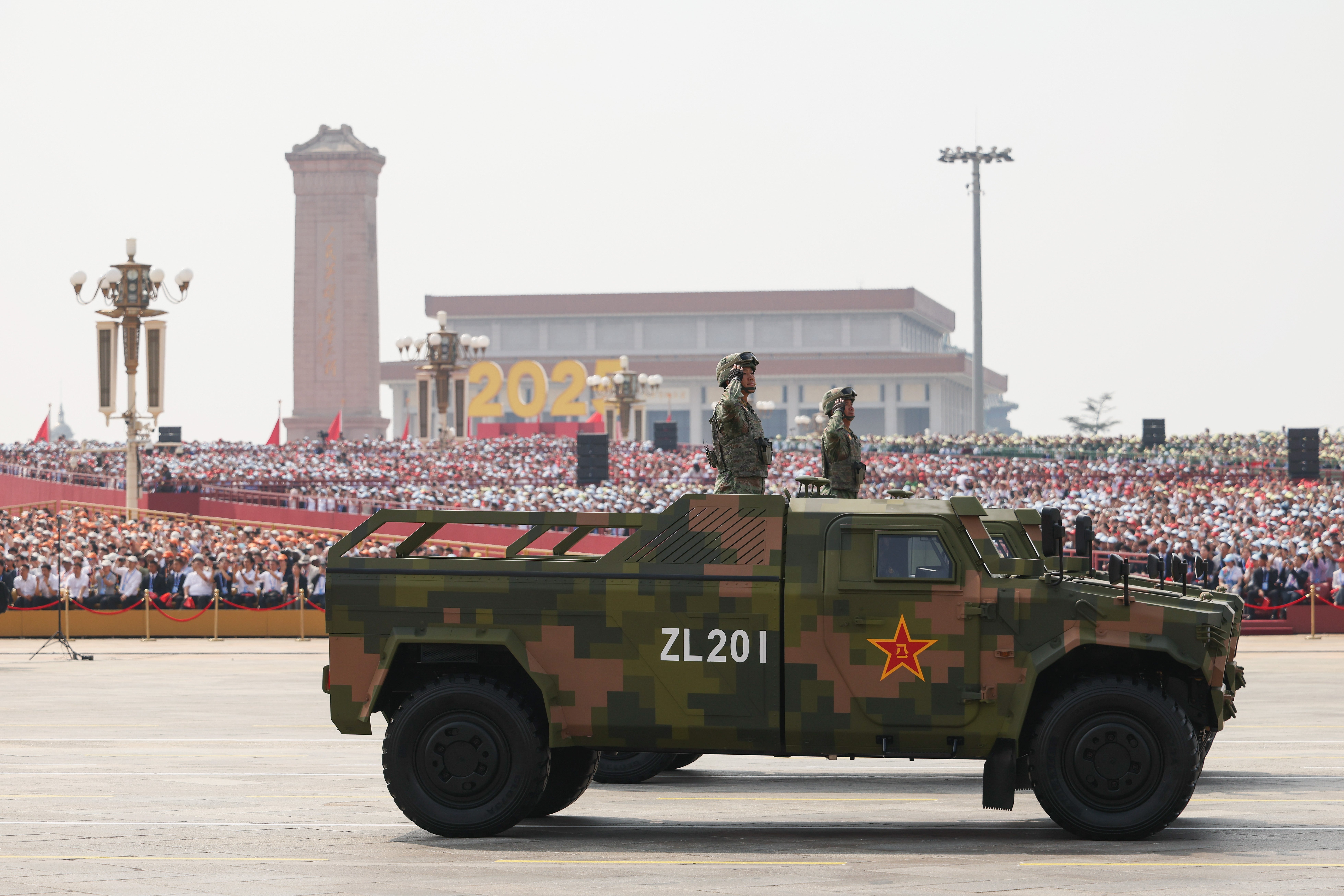 Armoured vehicles and soldiers are seen during a military parade marking the 80th anniversary of victory over Japan and the end of World War II, in Tiananmen Square on September 03, 2025, in Beijing, China. (Getty)