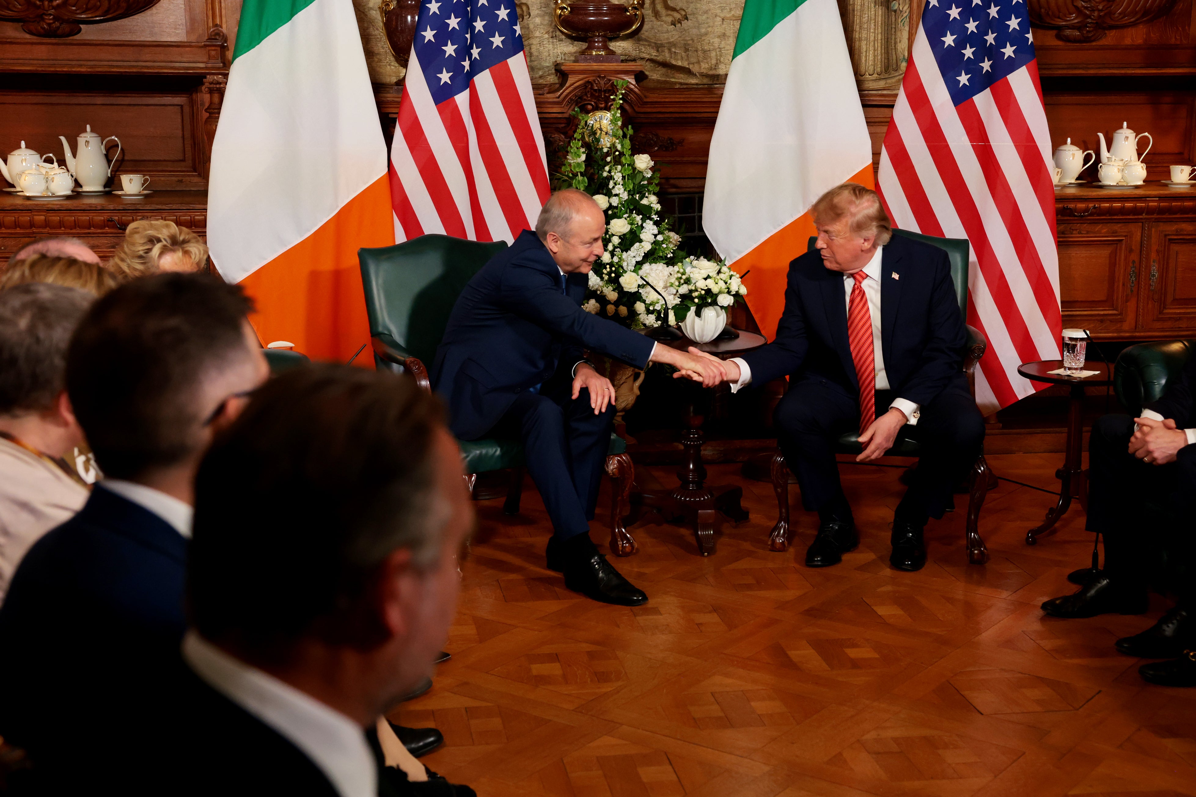Donald Trump (R) shakes hands with Taoiseach Micheal Martin on Saturday in Dublin (Getty)