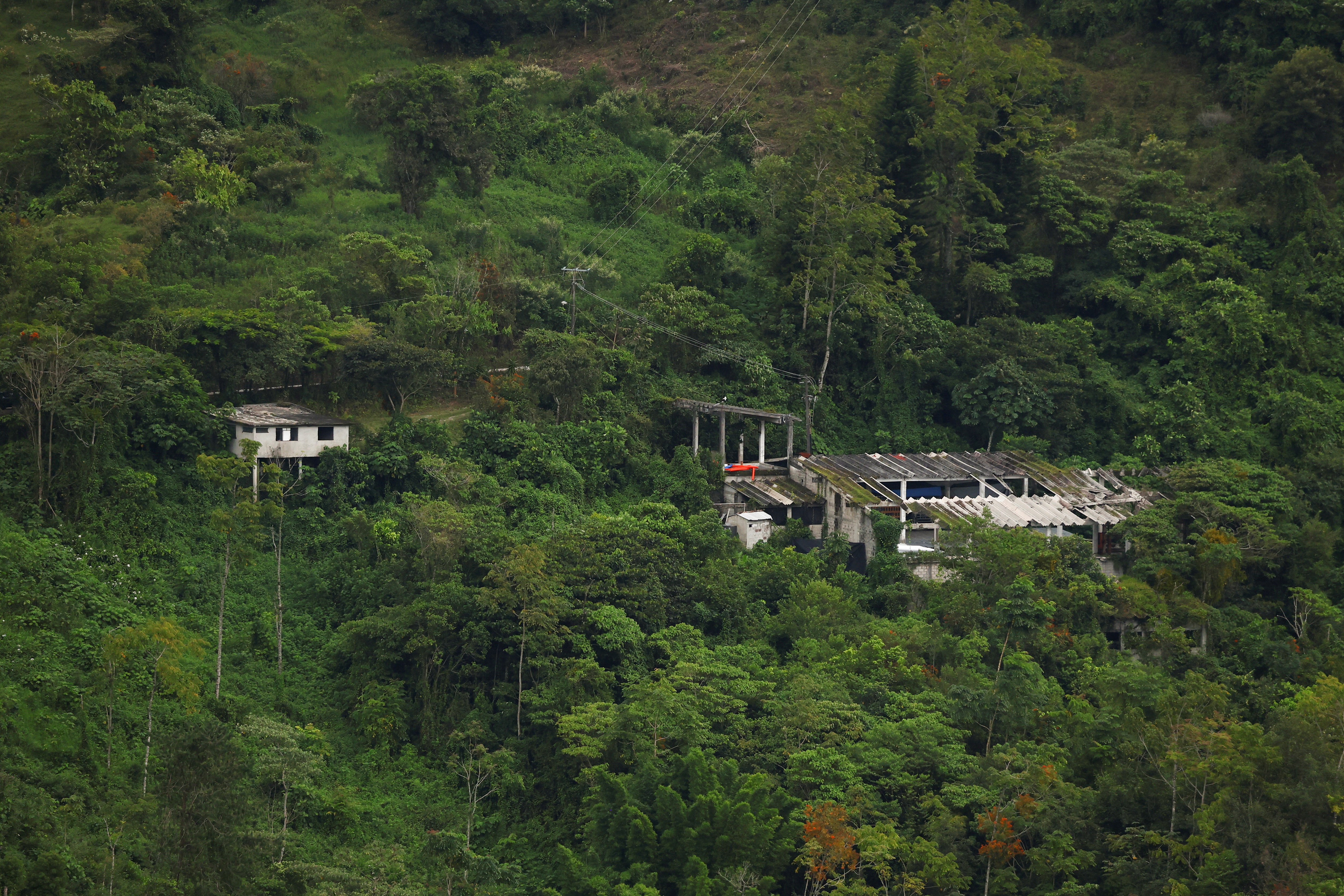 A view of the building where authorities said they found a suspected illegal cryptocurrency mining operation that was allegedly drawing power from infrastructure linked to a nearby hydroelectric system, in Tlaola