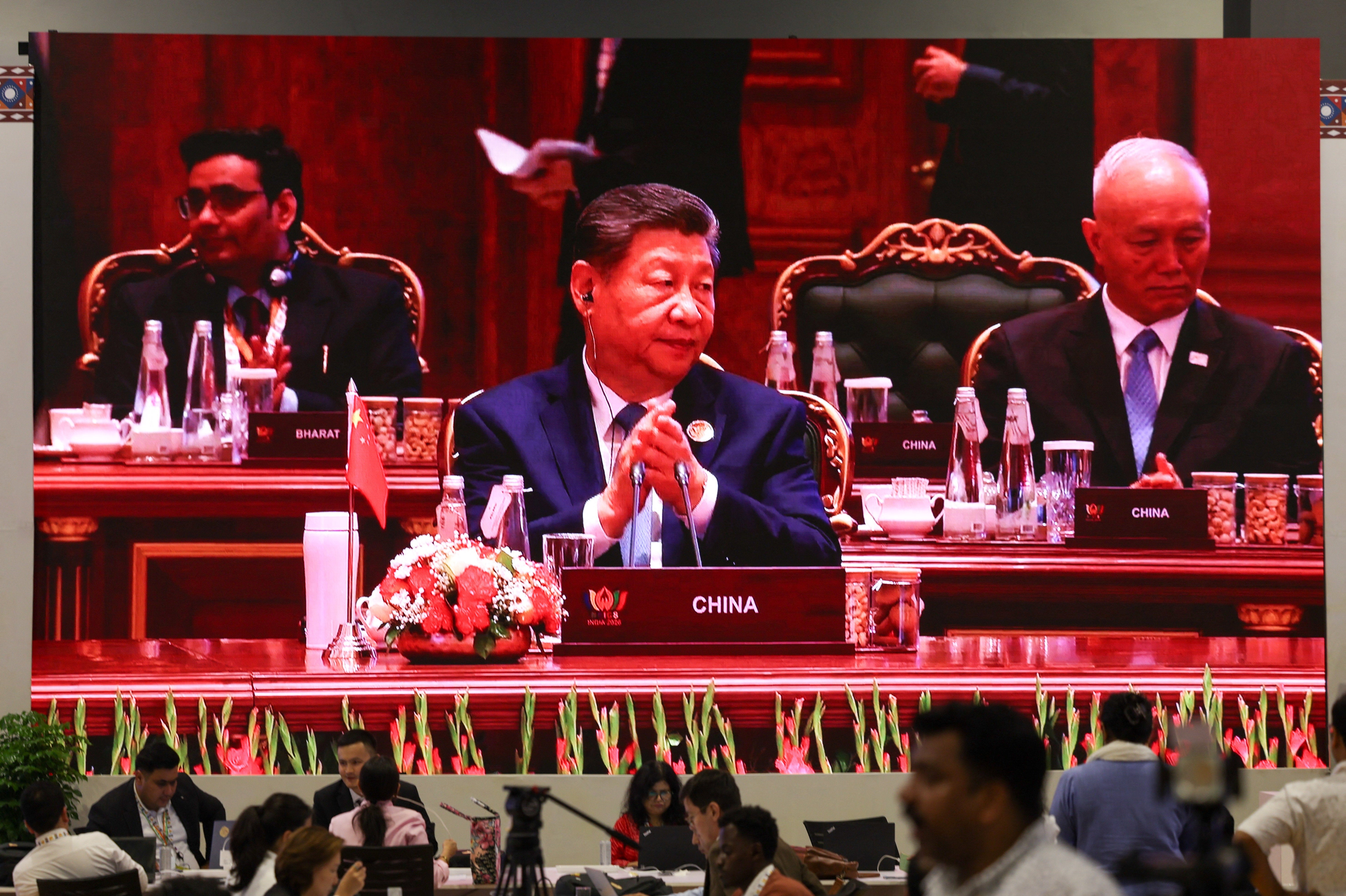 A screen shows Chinese president Xi Jinping during the Brics summit in Delhi, India, on 12 September 2026 (Reuters)