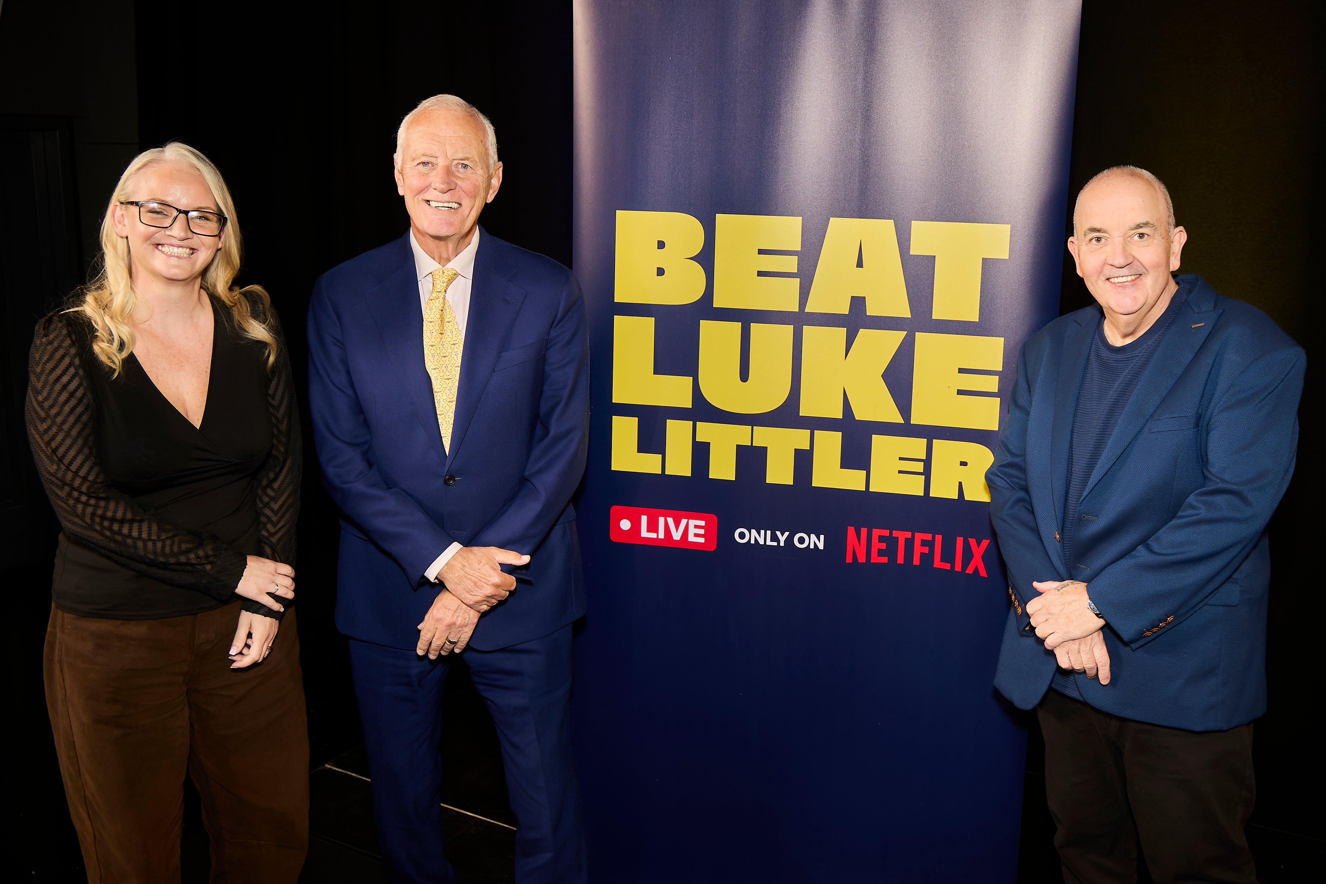 Barry Hern, Laura Turner and Phil Taylor.Thousands of amateur darts players arrived at the Queen Elizabeth Olympic Park in London today 12th Sept 2026 for the first of two open auditions to find the 20 finalists who will take on the two-time defending World Champion, Luke Littler, in Netflix’s upcoming live sports event, Beat Luke Littler.